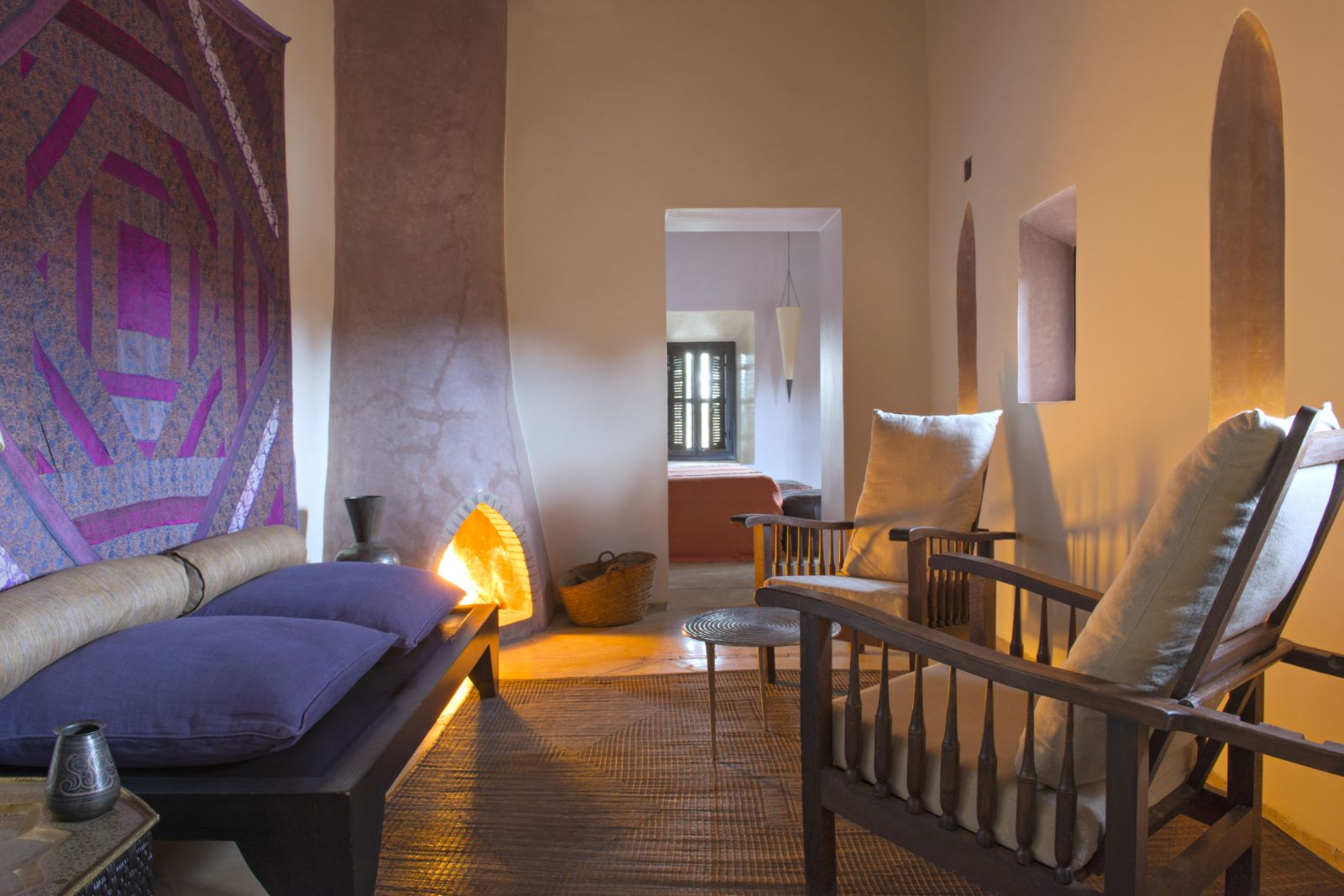 Guest suite with a fireplace at Dar Ahlam in Skoura