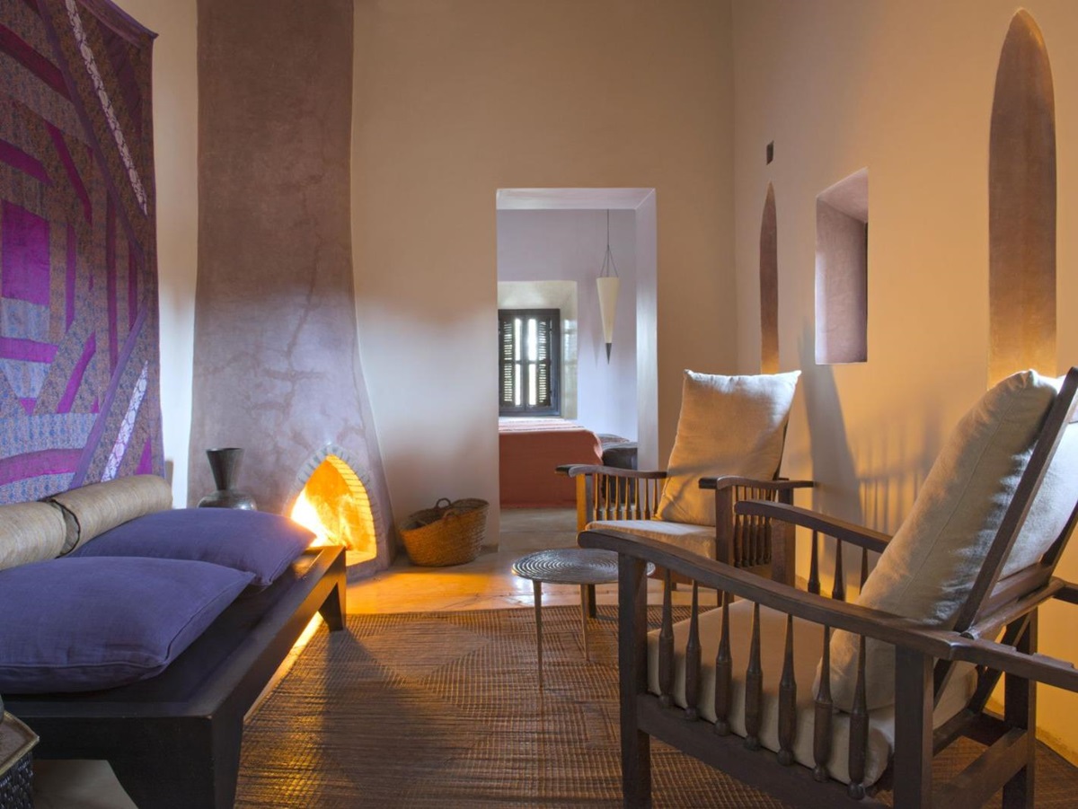 Guest suite with a fireplace at Dar Ahlam in Skoura