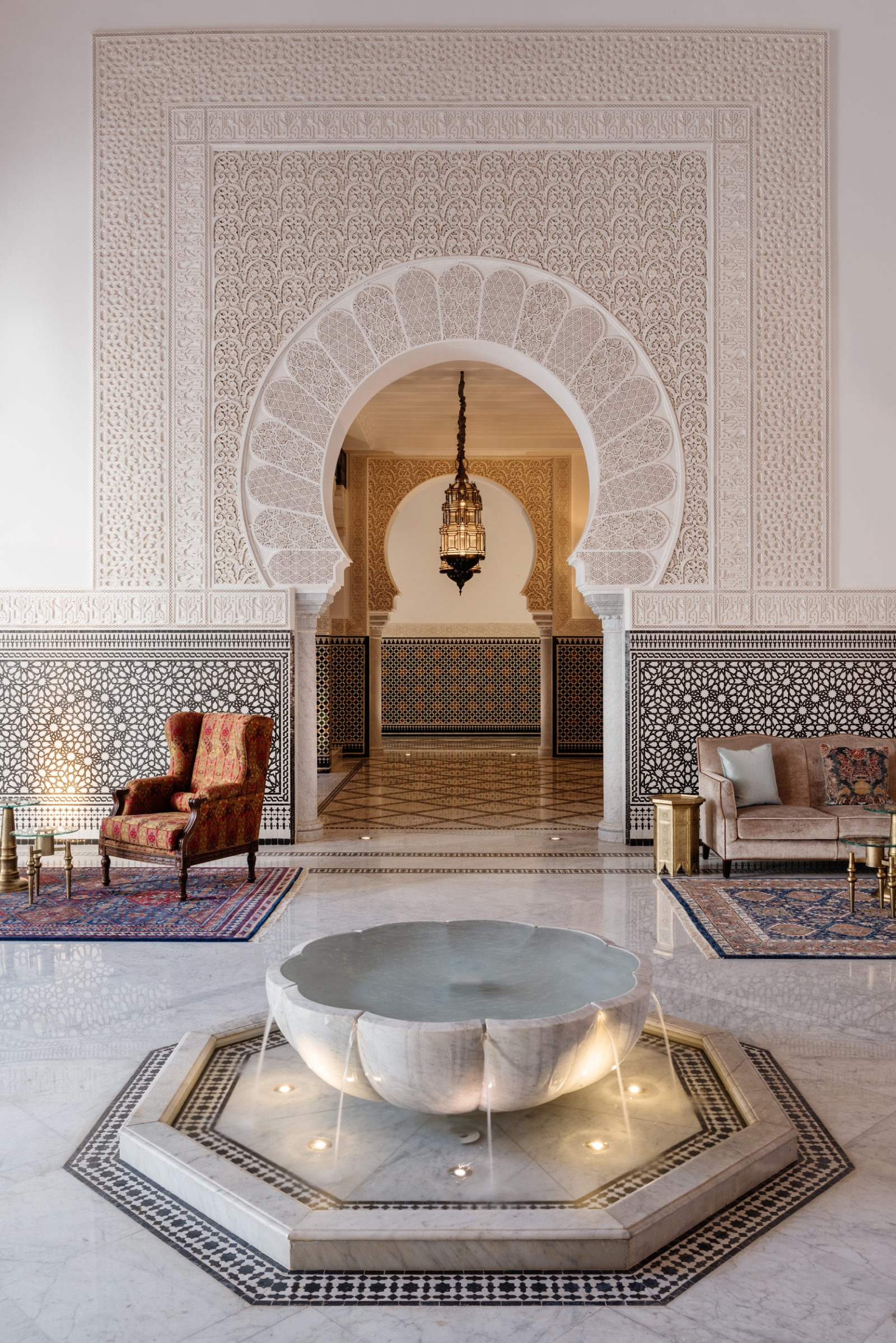 Interior of reception ath The Oberoi Marrakech with water feature and mosaics