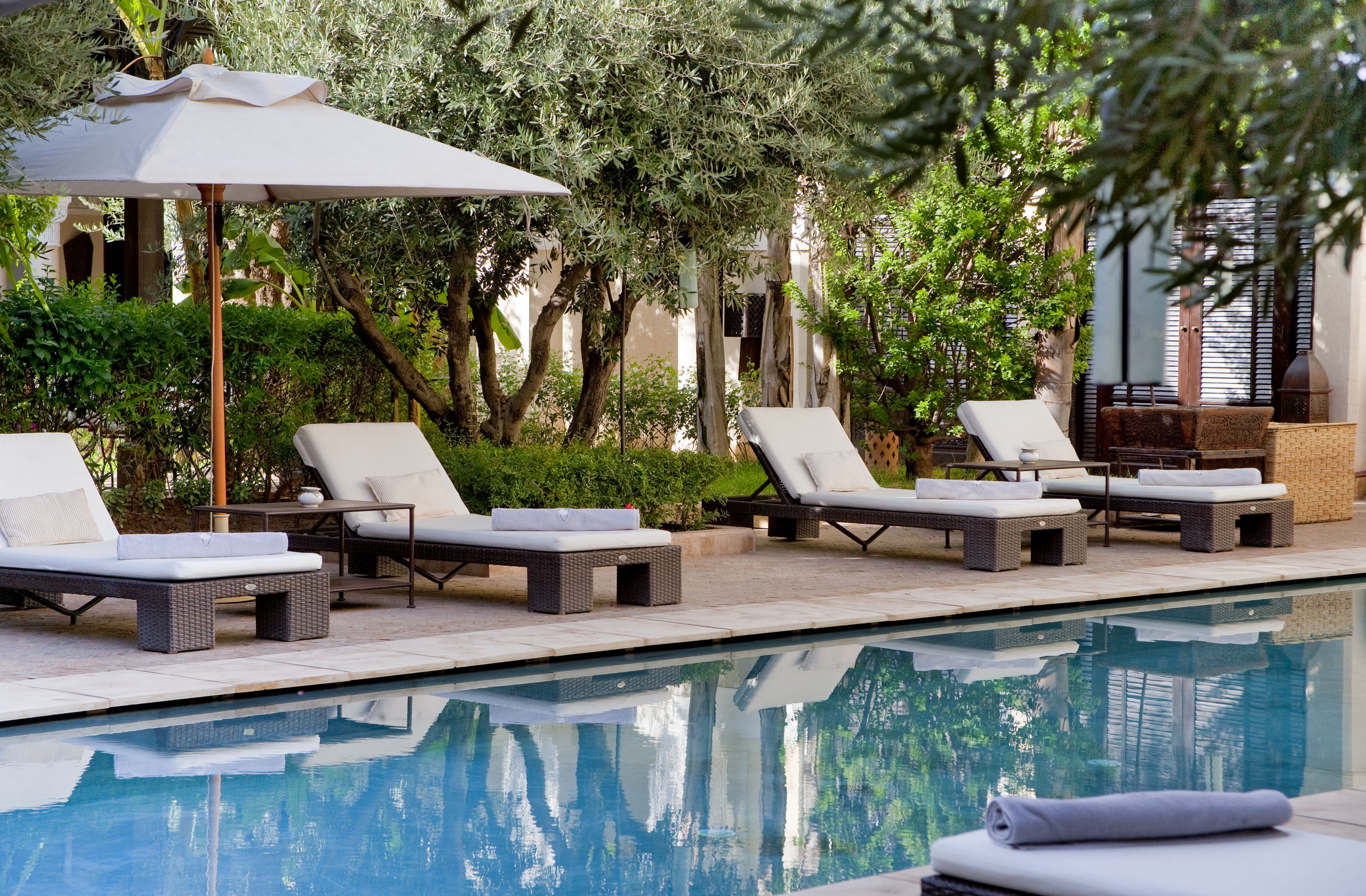 The pool and gardens at Villa des Orangers
