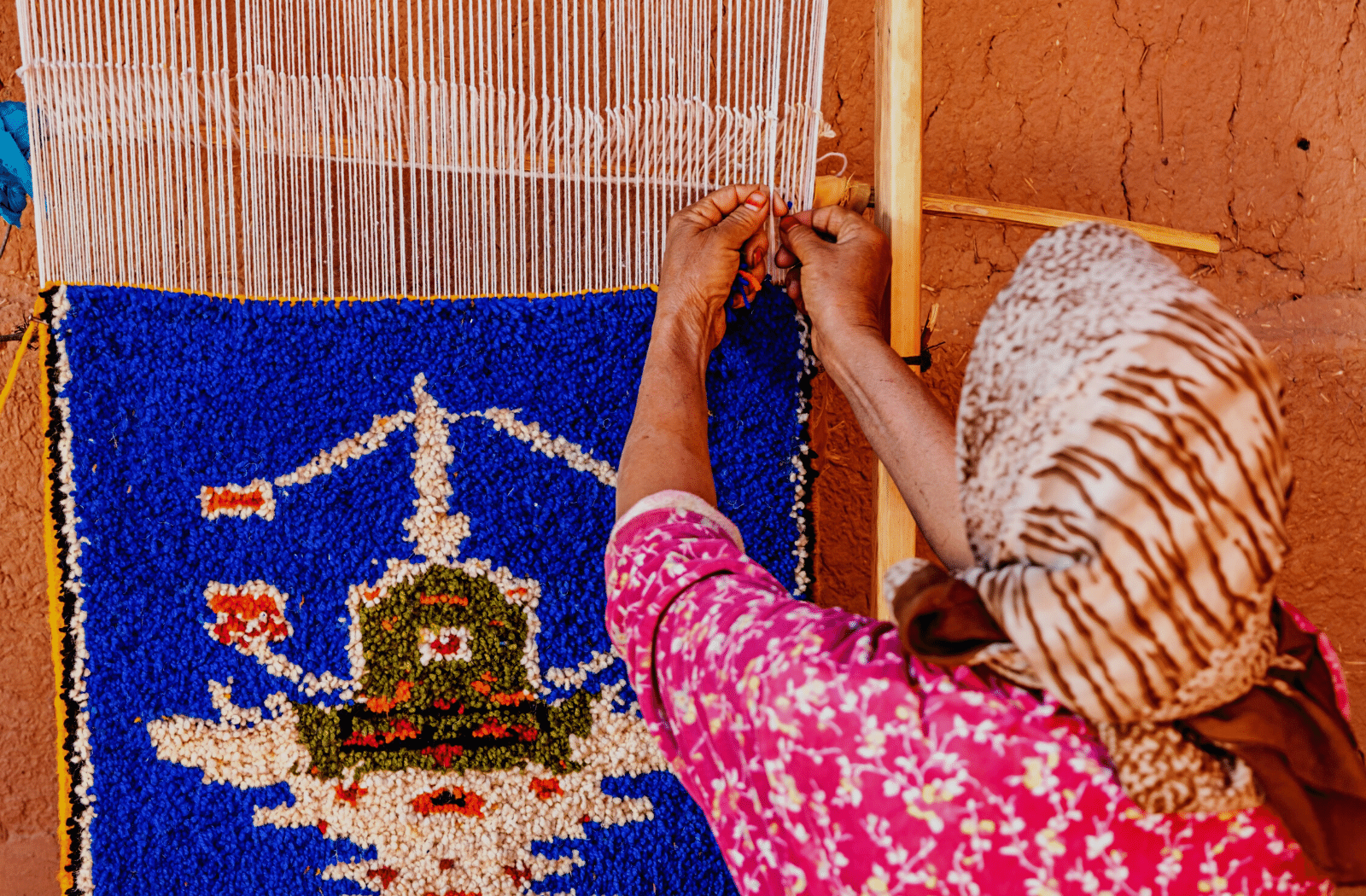 Berber woman on the loom in Morocco