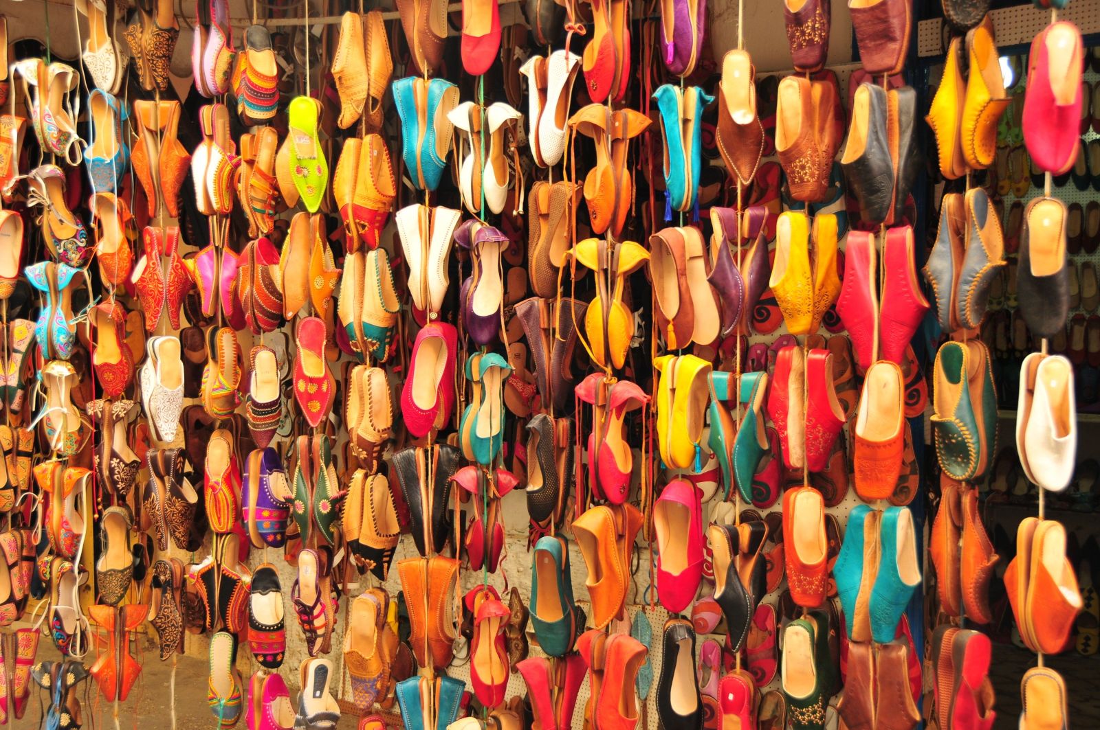 Colourful display of traditional Moroccan slippers in a Marrakech market