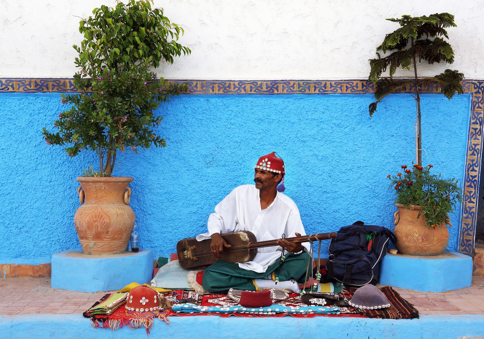 A musician performing in a Moroccan street