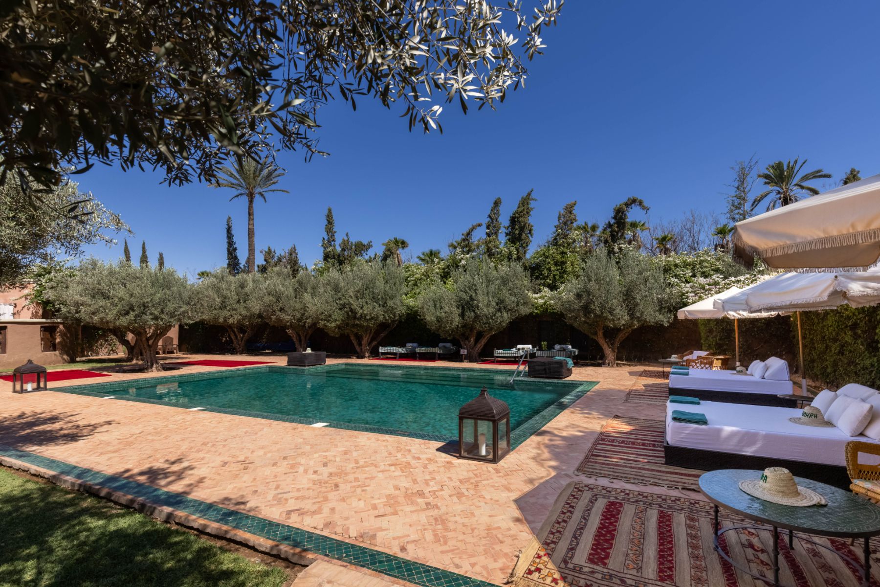 Azzaytouna pool and sunloungers at Villa Ezzahra in Morocco