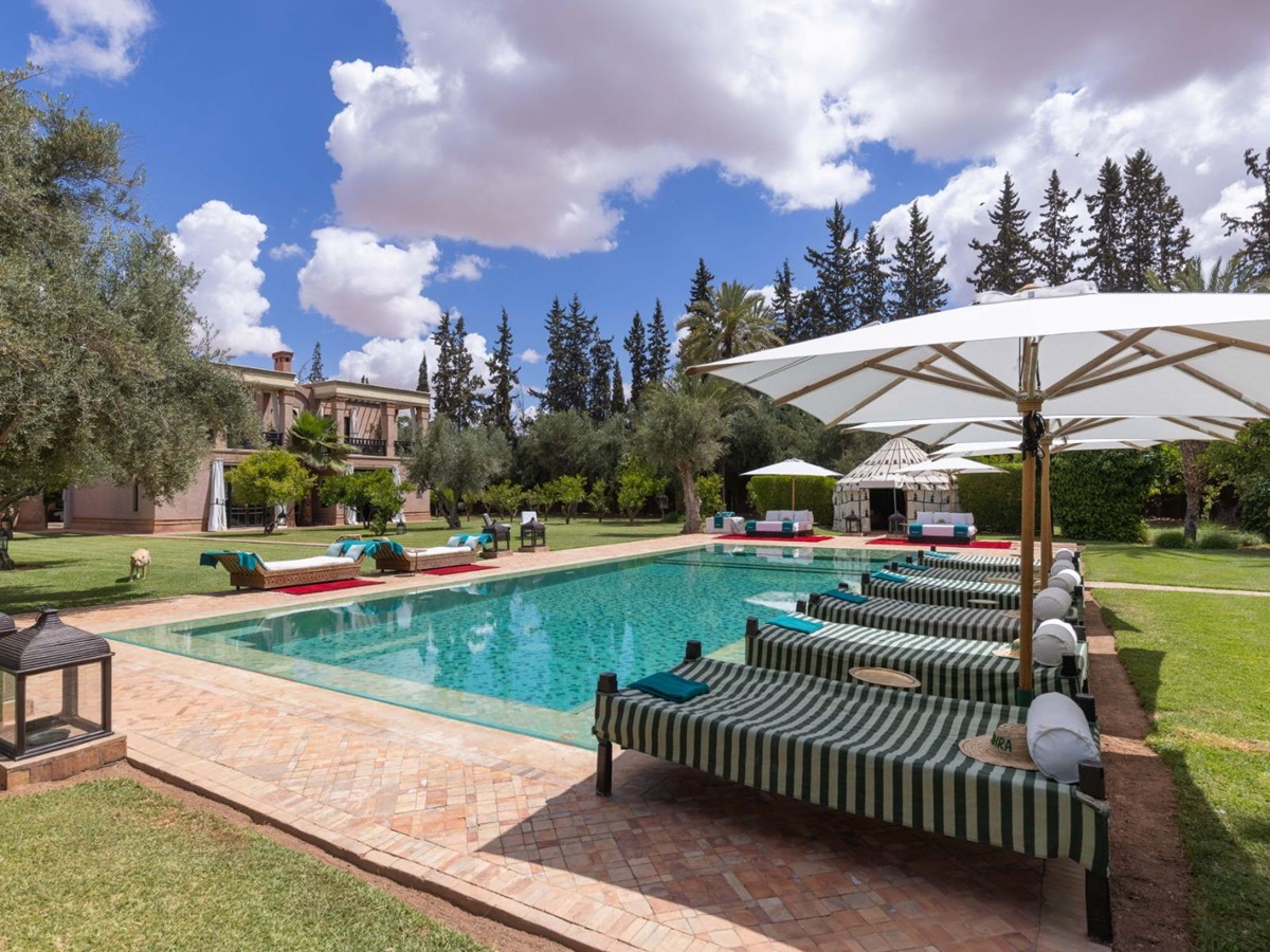 Main pool and sunloungers at Villa Ezzahra in Morocco
