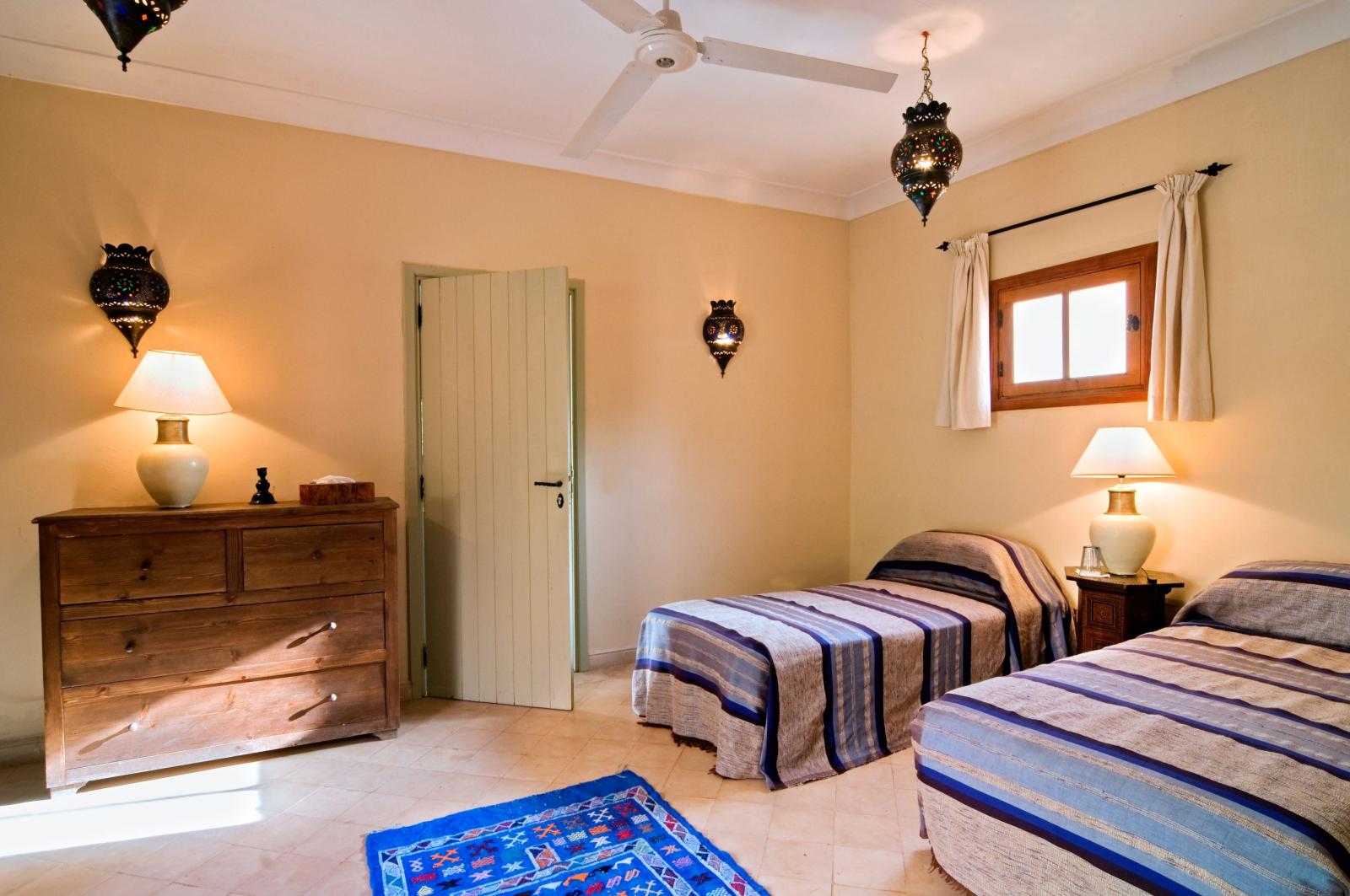 A twin bedroom at Villa Alexandra