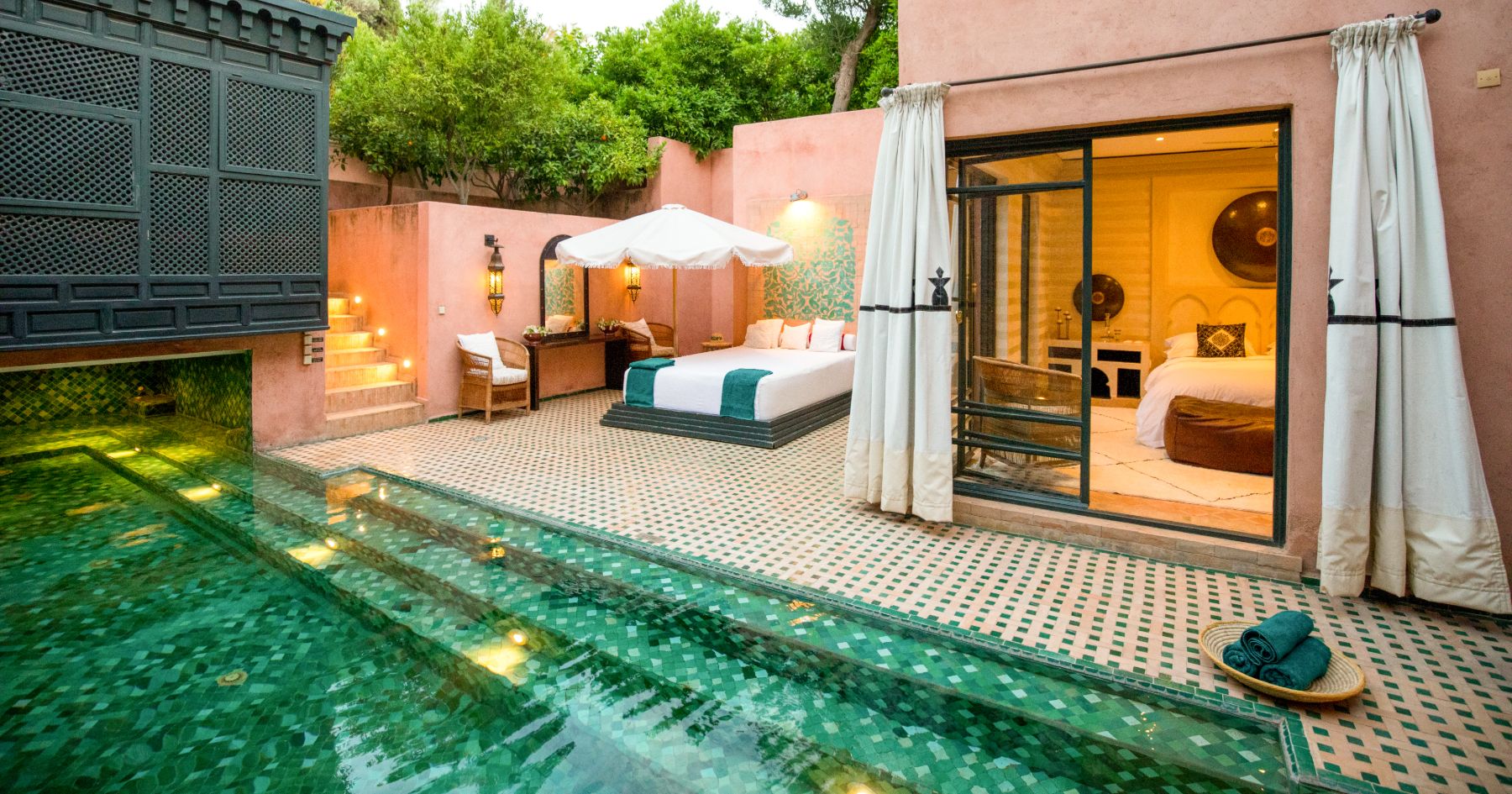 Pool and sun lounger at Villa Alkhozama in Morocco