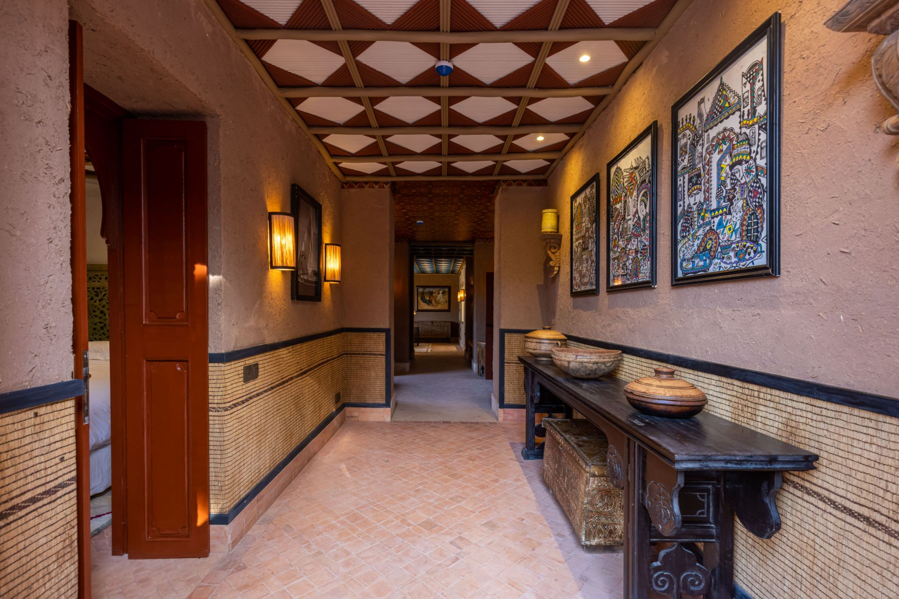 Hallway and wall art at Villa Azeer in Morocco