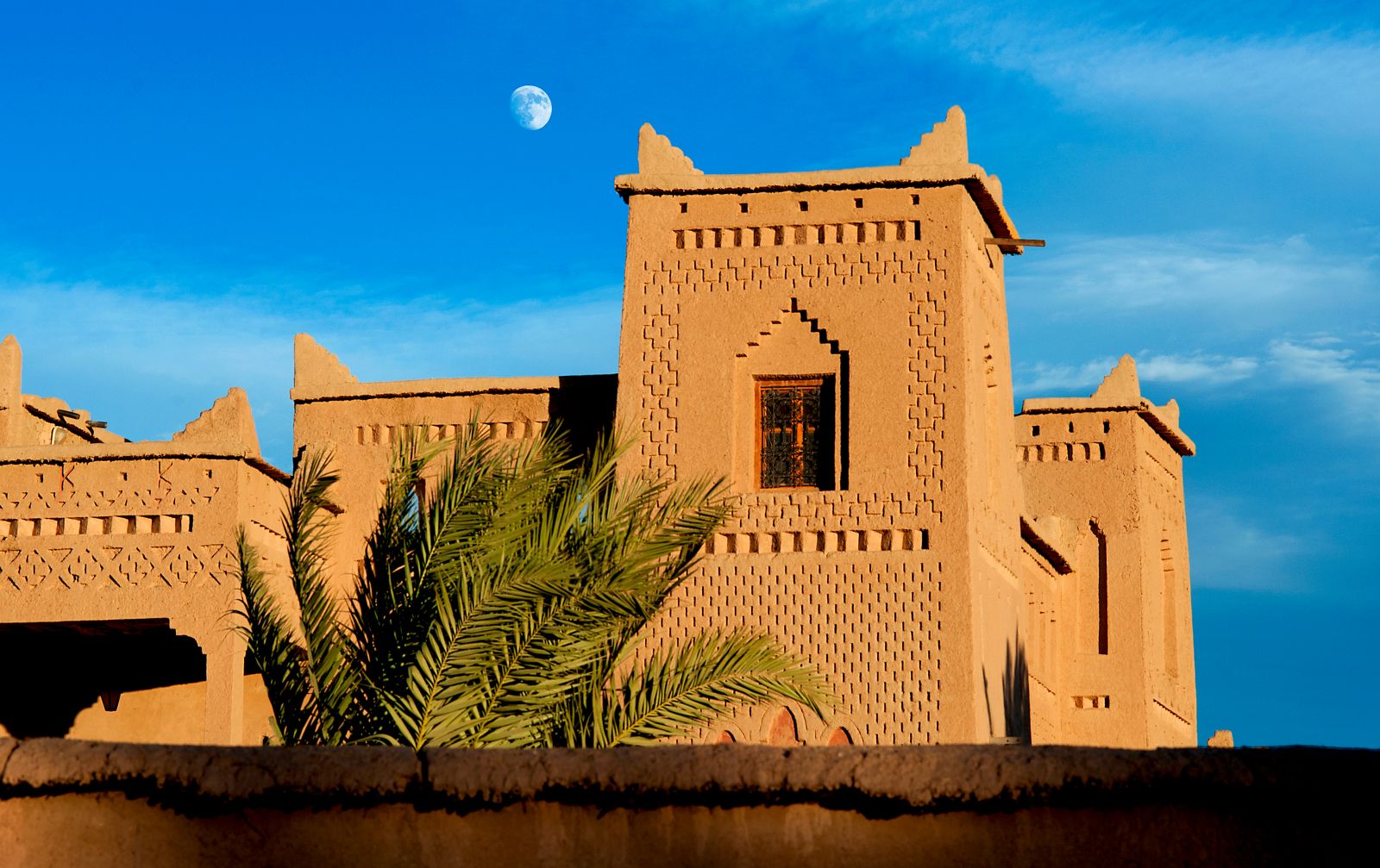 The riad in Skoura Morocco against a bright blue sky