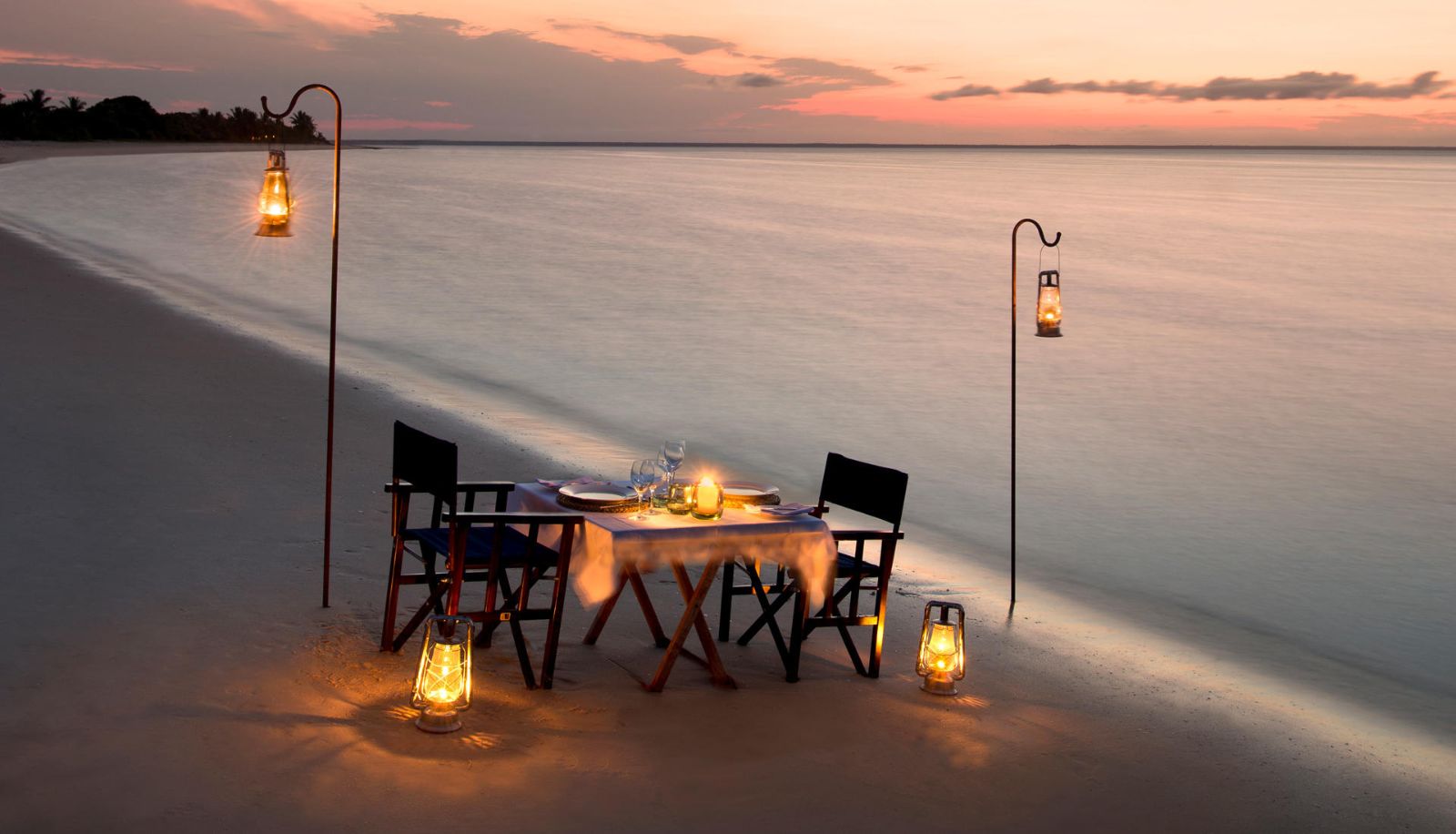 Table set for alfresco beach dining at &Beyond Benguerra Island in Mozambique