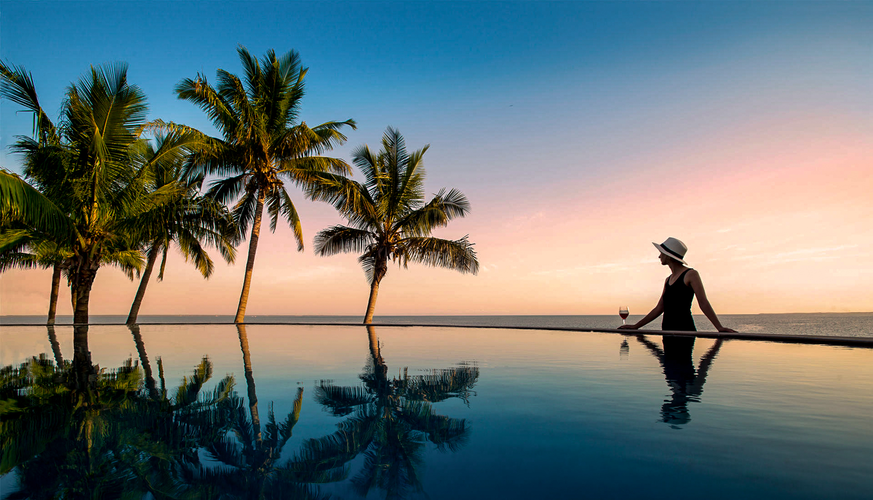 Swimming pool at sunset at &Beyond Benguerra Island
