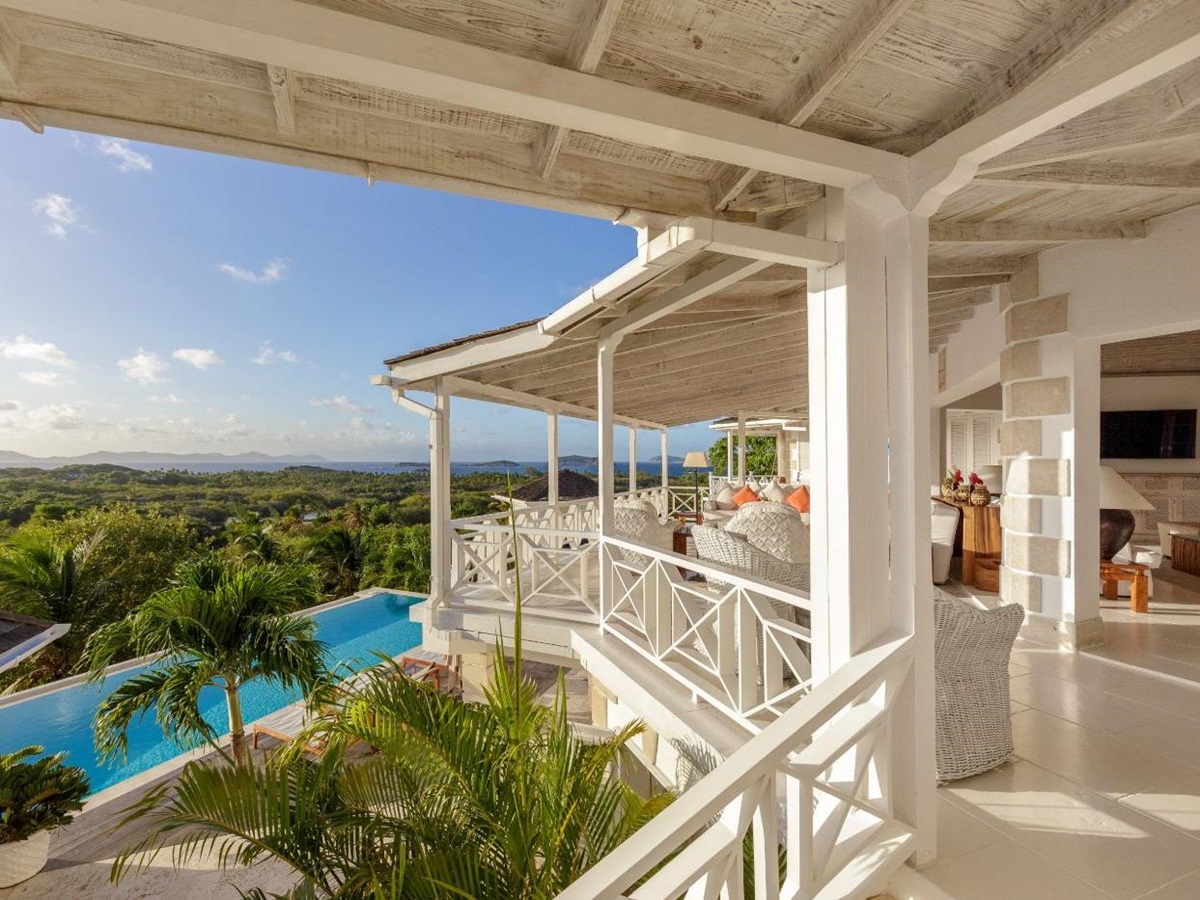 Terrace at Callaloo with views of the pool and gardens