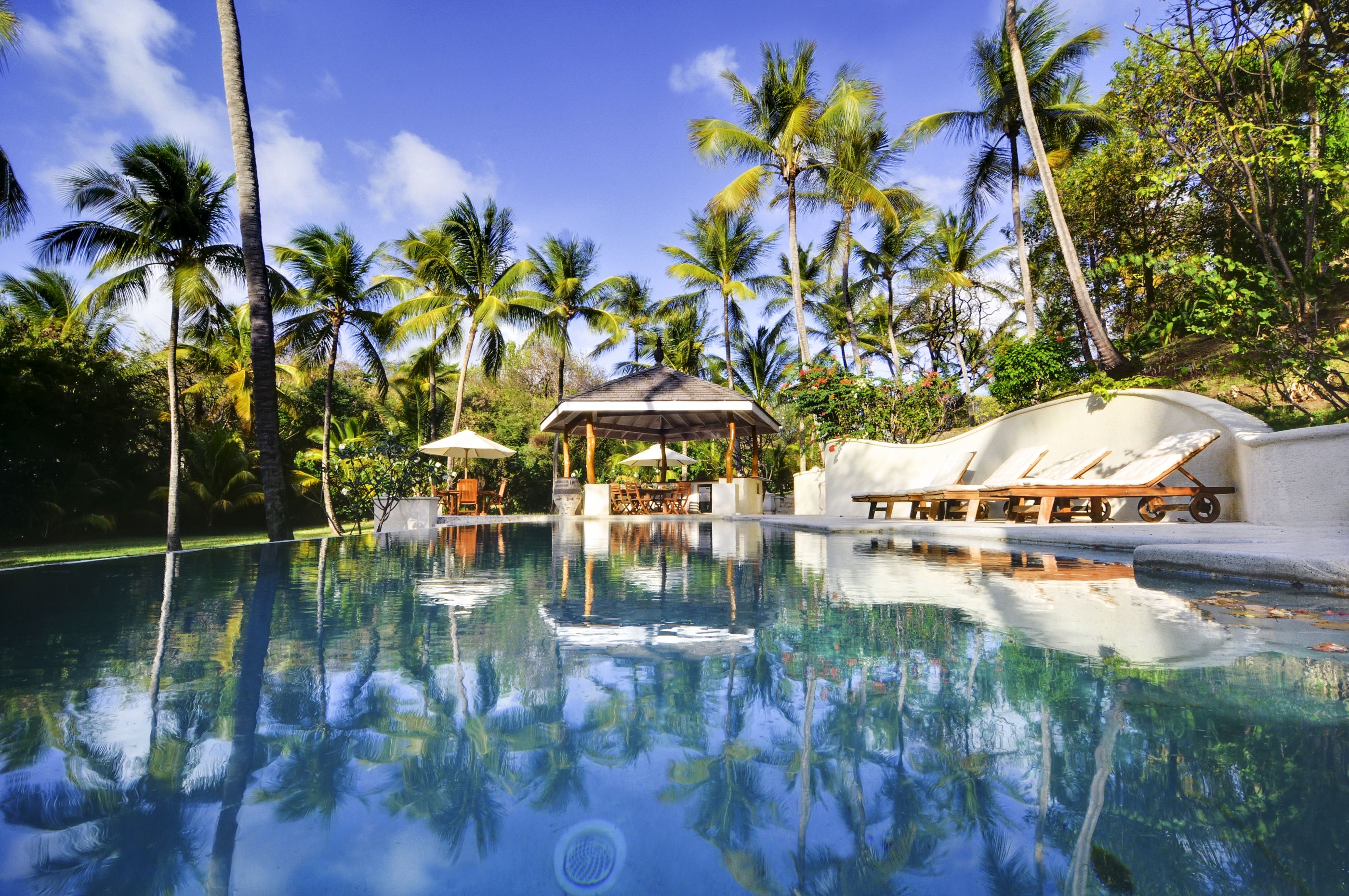 Swimming pool and sun loungers at Gingerbread, Mustique