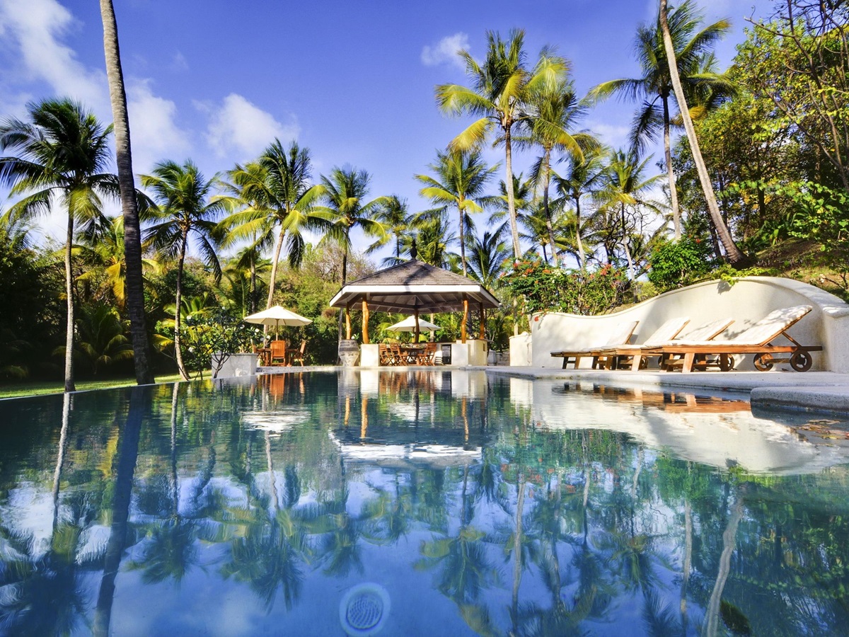 Swimming pool and sun loungers at Gingerbread, Mustique