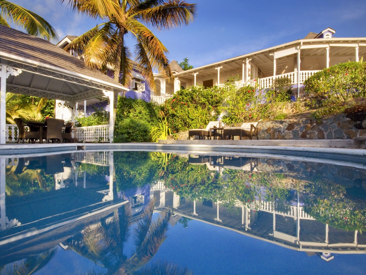 Swimming pool and facade of Gingerbread, Mustique