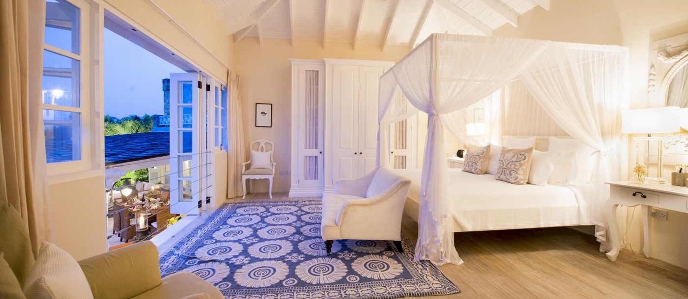 Wooden double bedroom of Greystone Cottage, Mustique