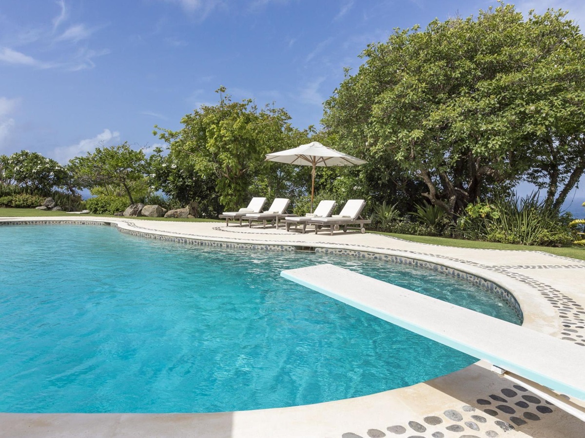 Swimming pool and diving board of Ilanga, Mustique