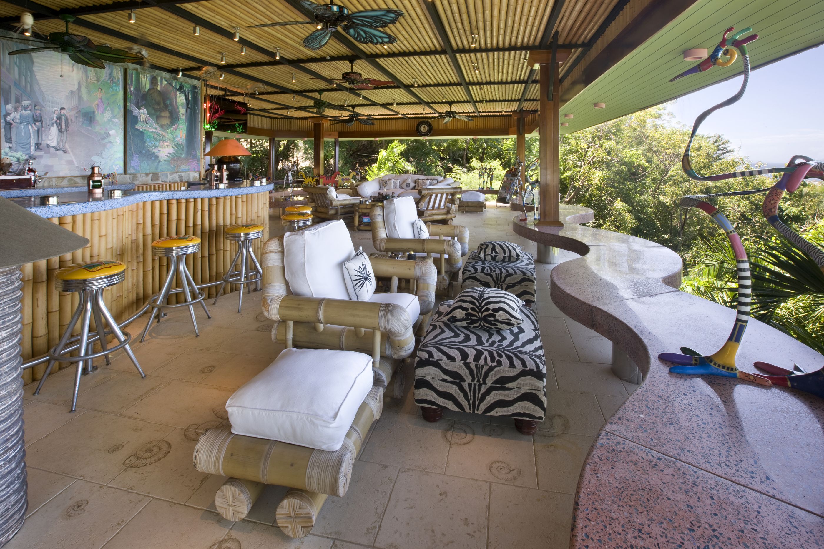 The terrace with ocean view of Ilanga, Mustique