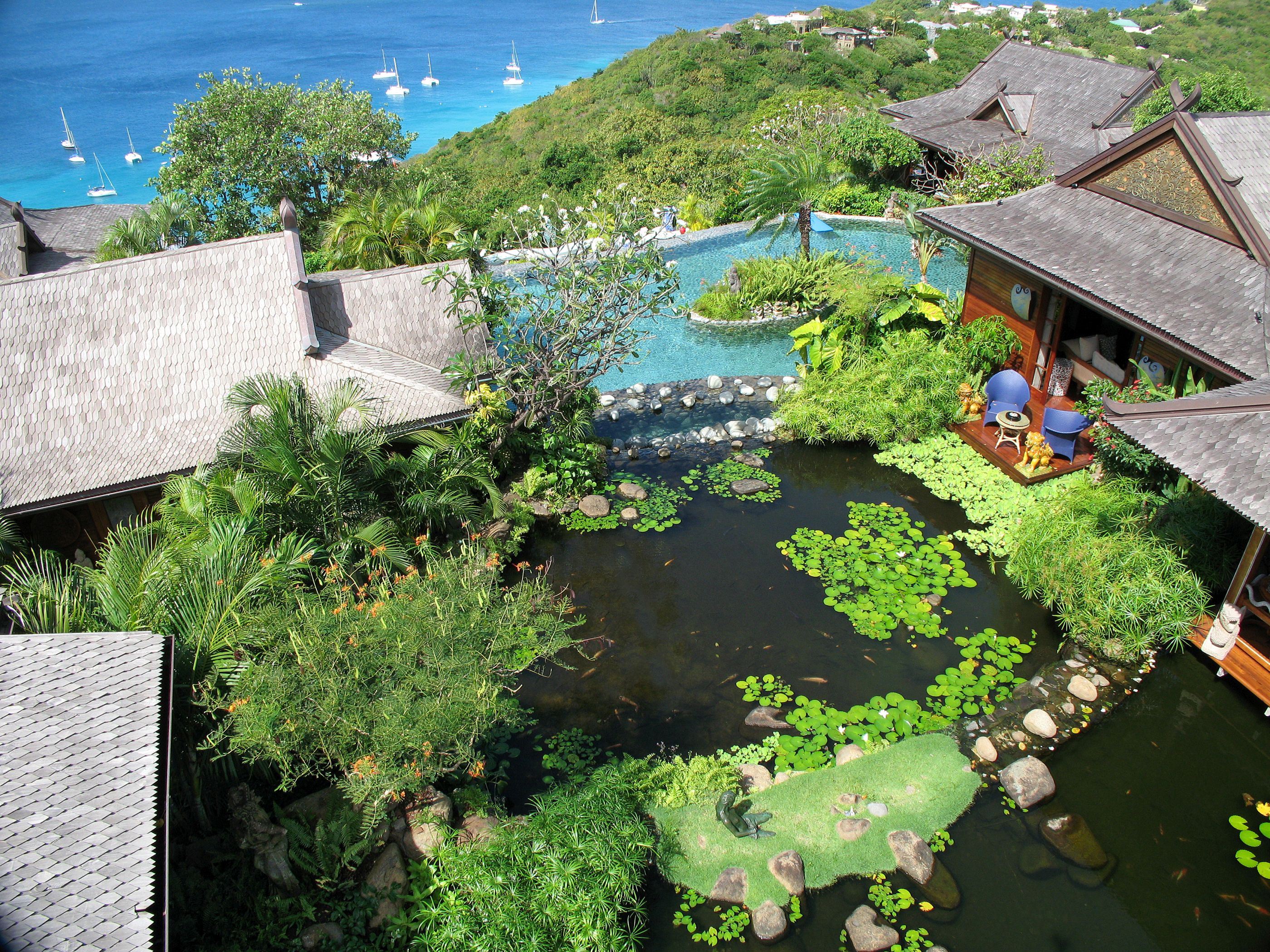 The gardens and house and pond of Ilanga, Mustique