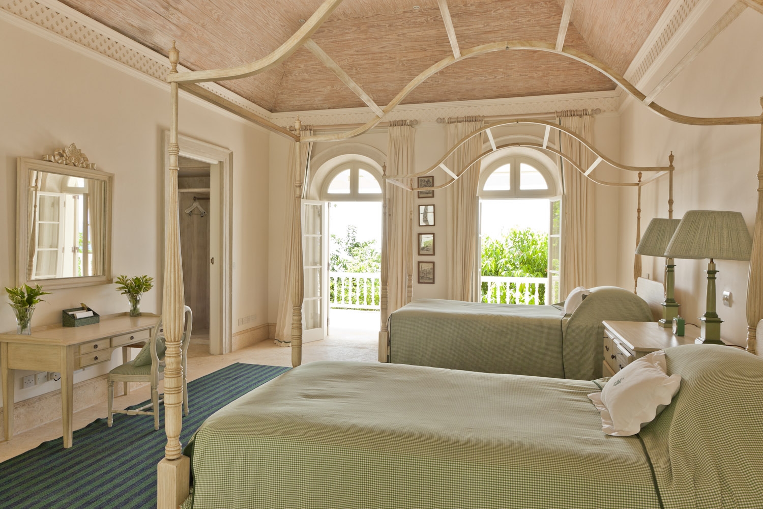 Twin bedroom in Plantation House, Mustique