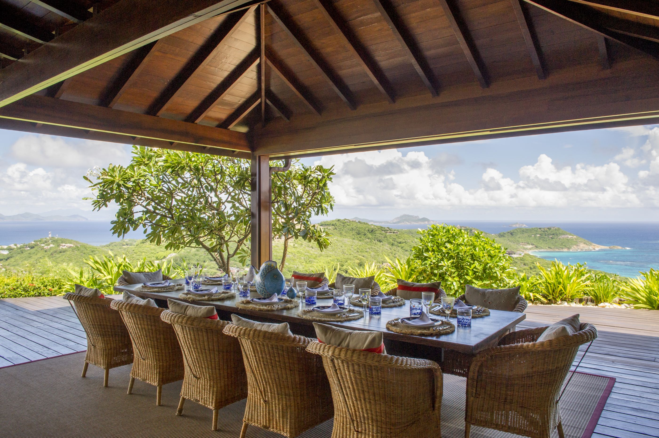 Outdoor dining at Ocean Breeze, Mustique