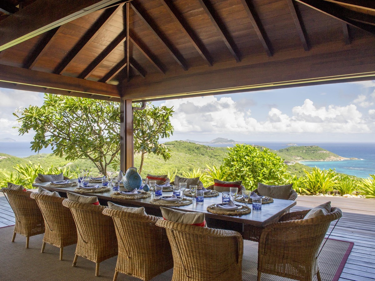 Outdoor dining at Ocean Breeze, Mustique