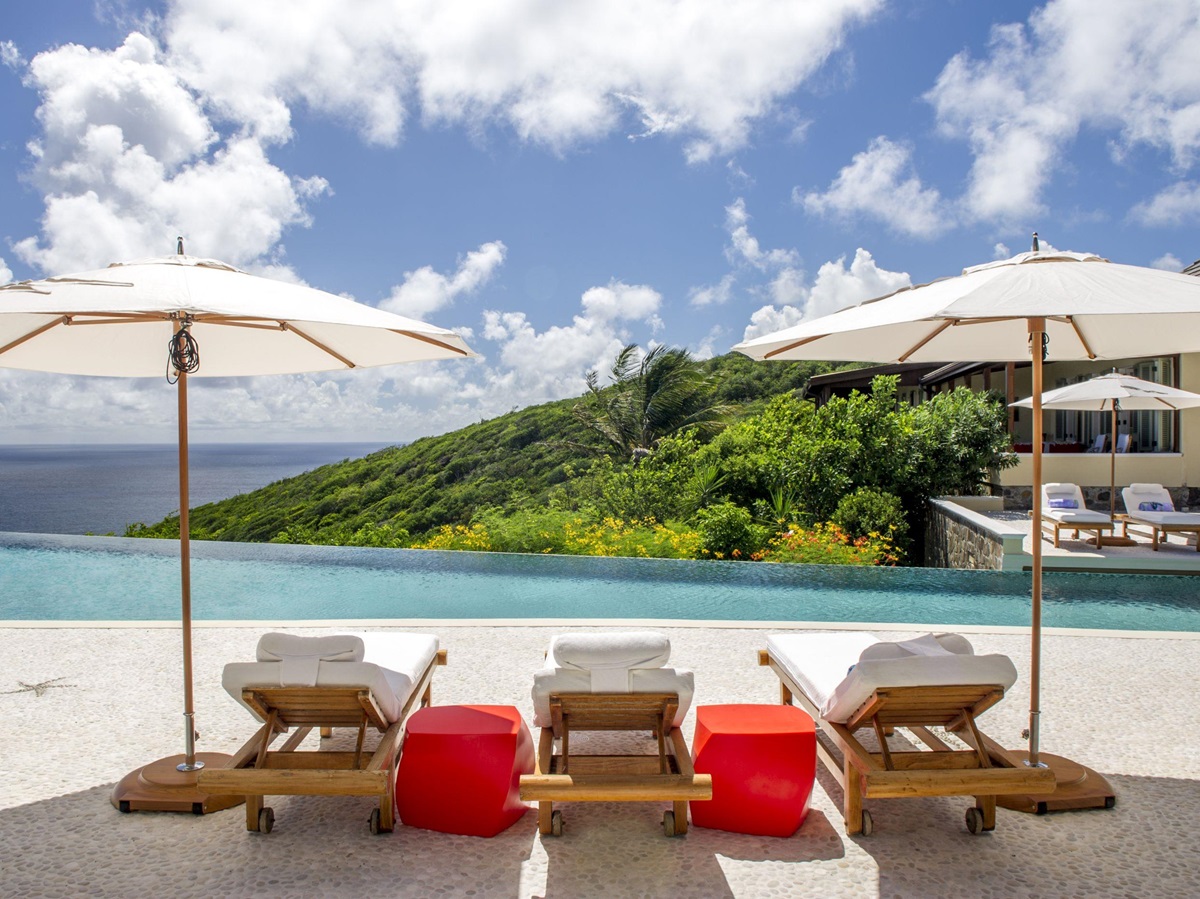 Swimming pool with a view of Ocean Breeze, Mustique