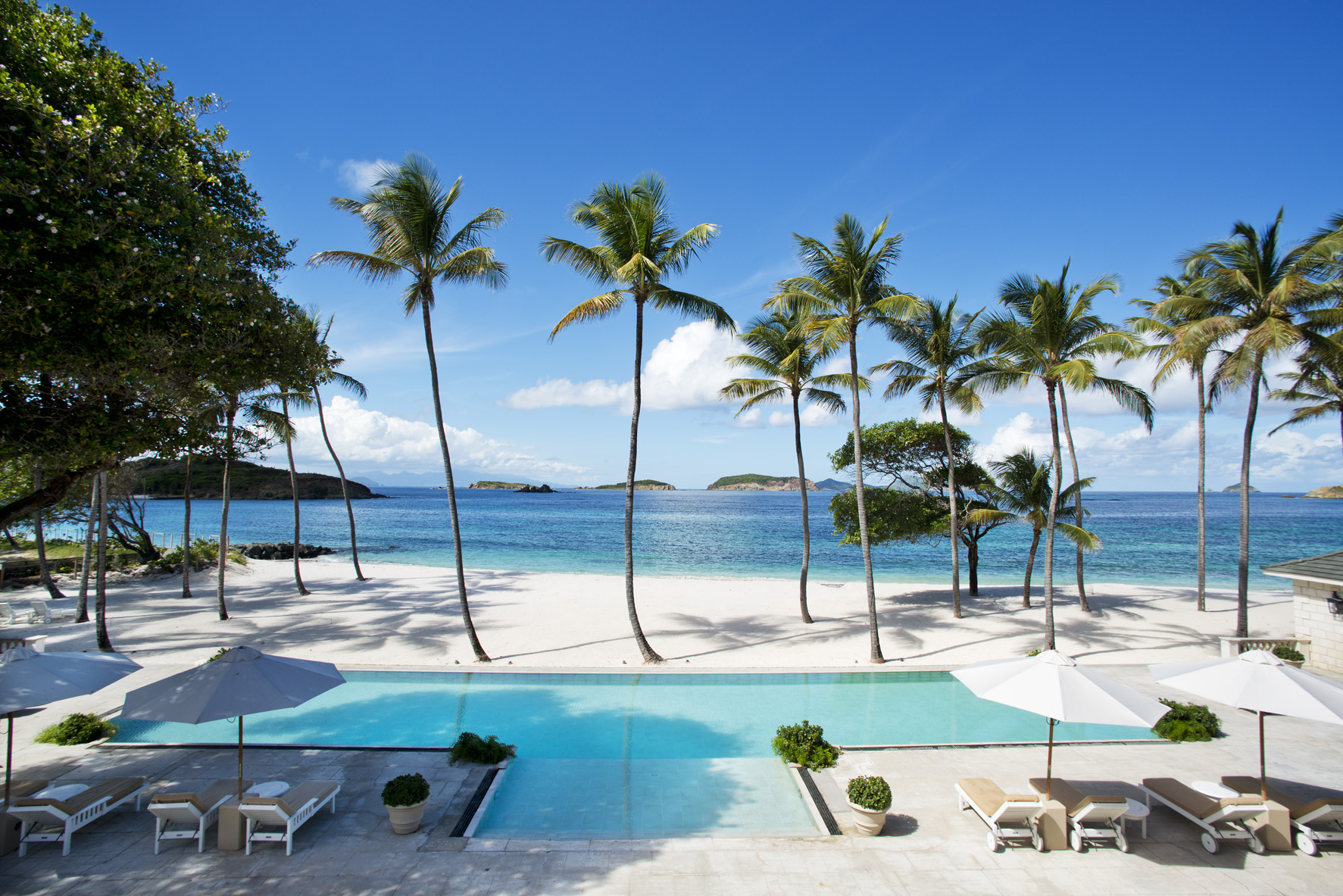 Swimming pool and beach of Palm Beach, Mustique