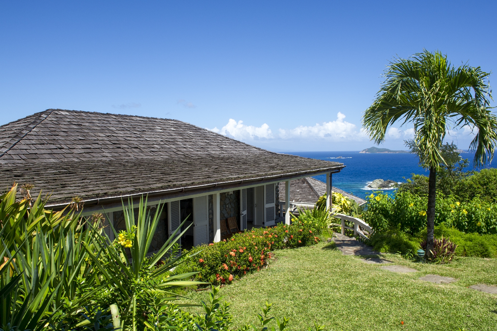 Exterior view of plantation-style villa Pangolin in Mustique