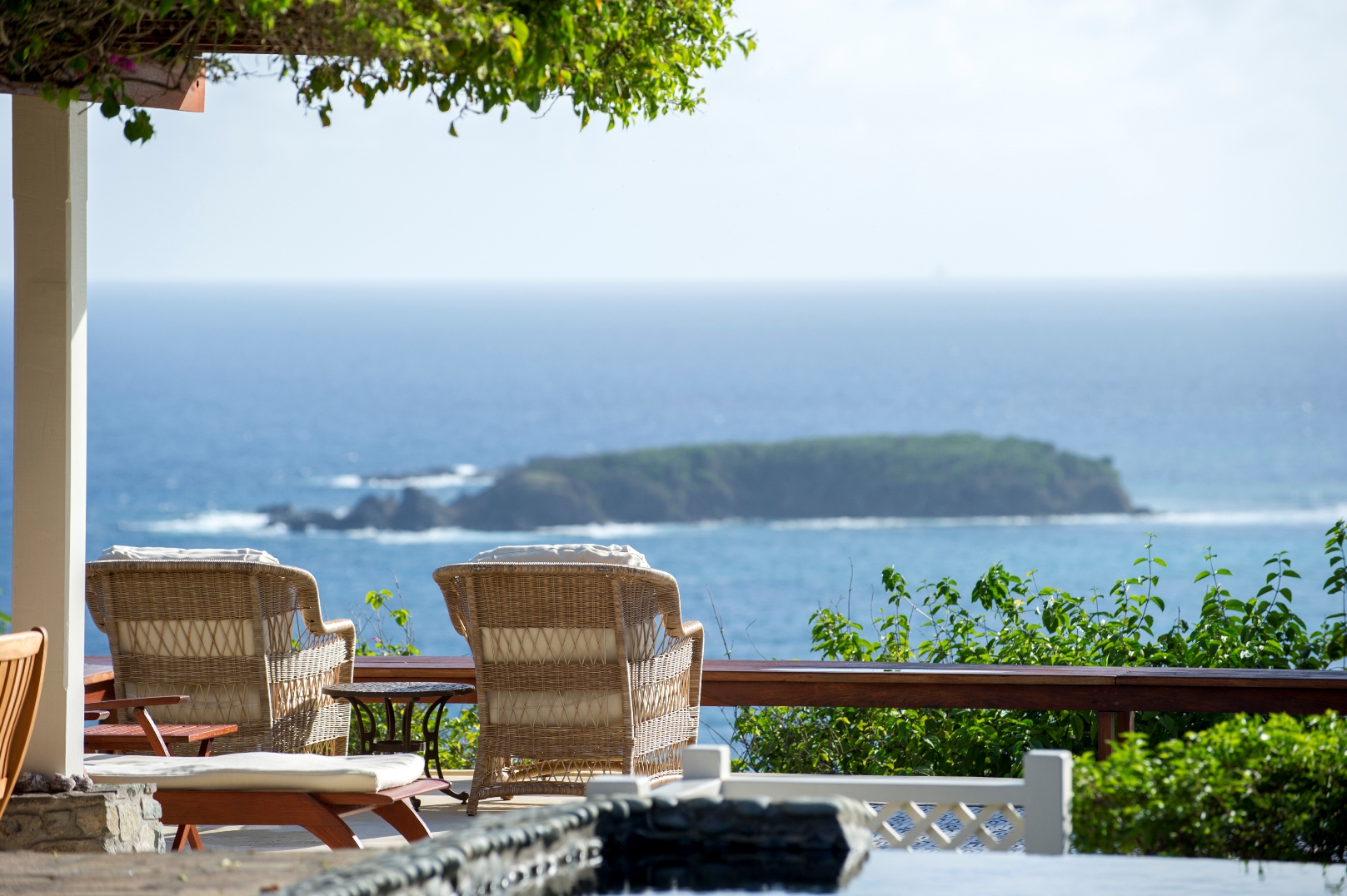 view of an island seen from the terrace at villa Pangolin in Mustique