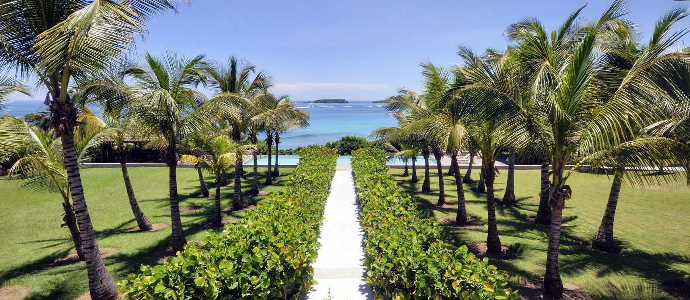 Gardens and pathway leading to the beach near Sleeping Dragon, Mustique