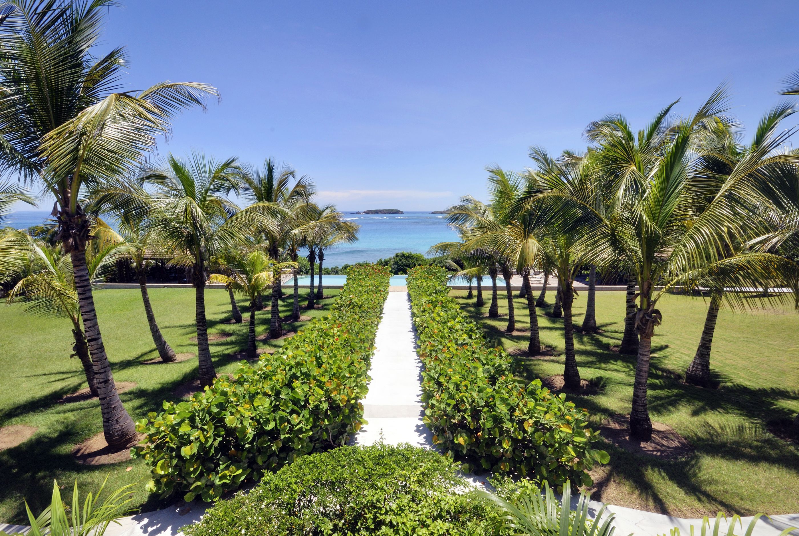 Gardens and pathway leading to the beach near Sleeping Dragon, Mustique