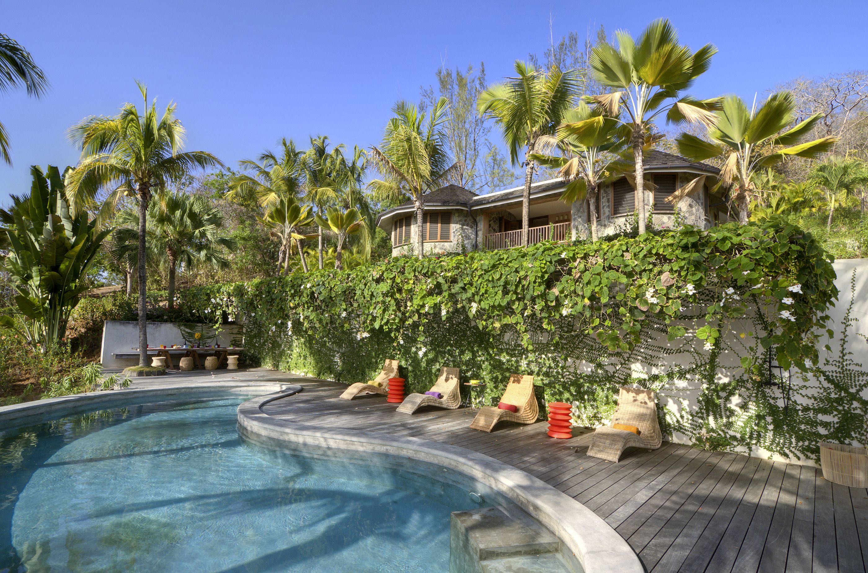 Swimming pool and facade of Villa America, Mustique