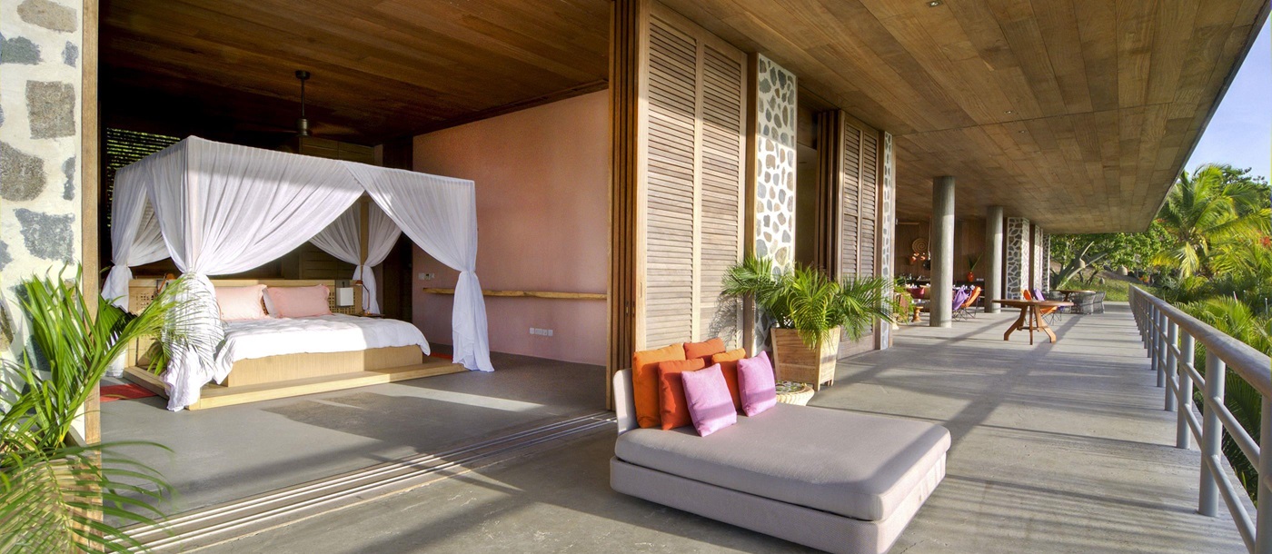 Terrace and bedroom entrance at Villa America, Mustique