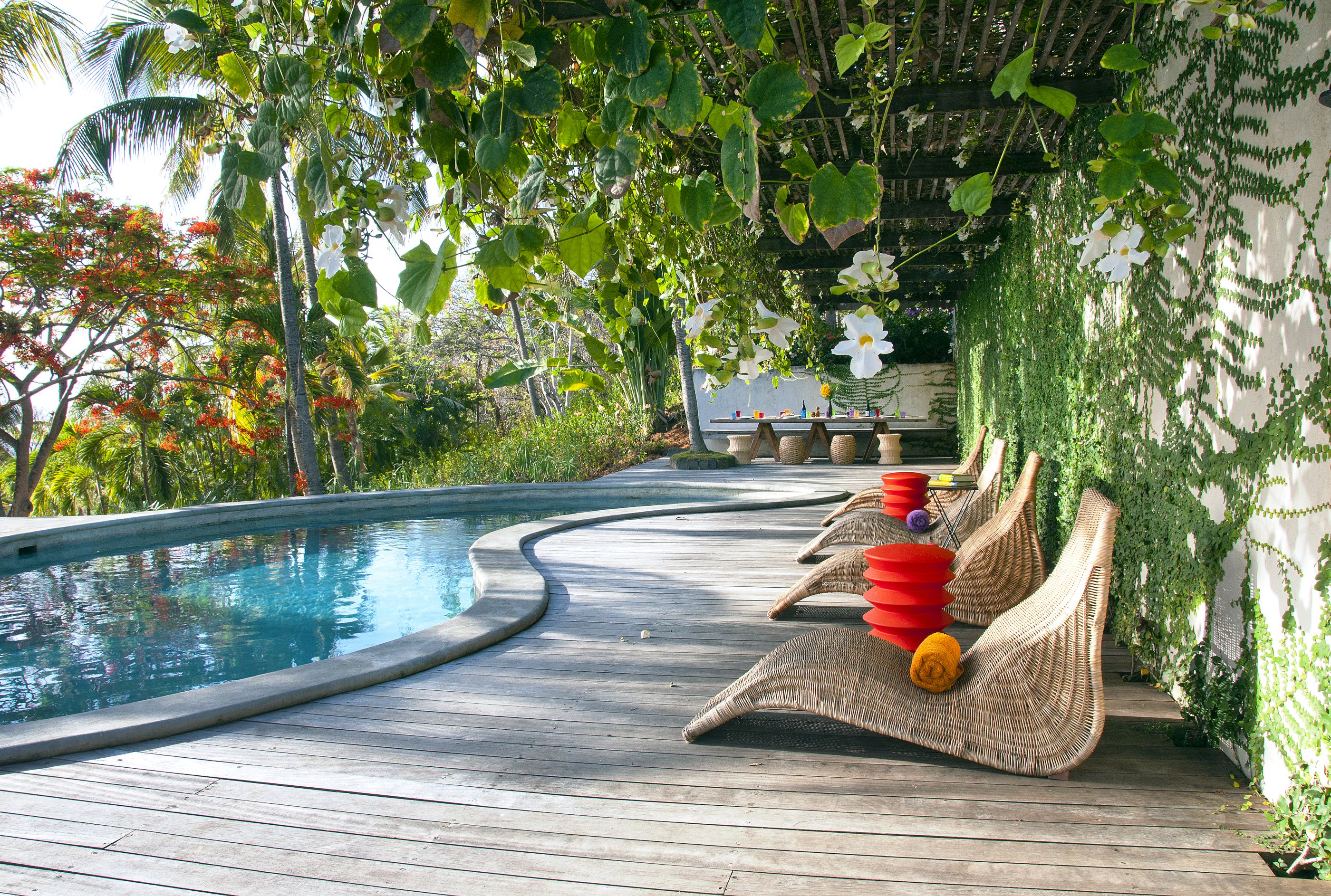 Sunbeds at the swimming pool of Villa America, Mustique