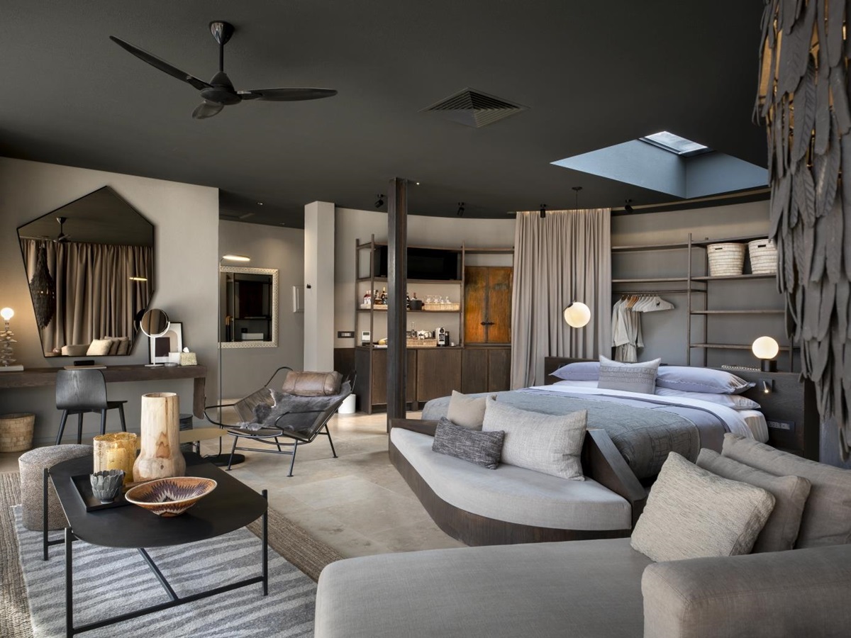 Interior of a spacious guest suite with skylight above the bed for night-time stargazing