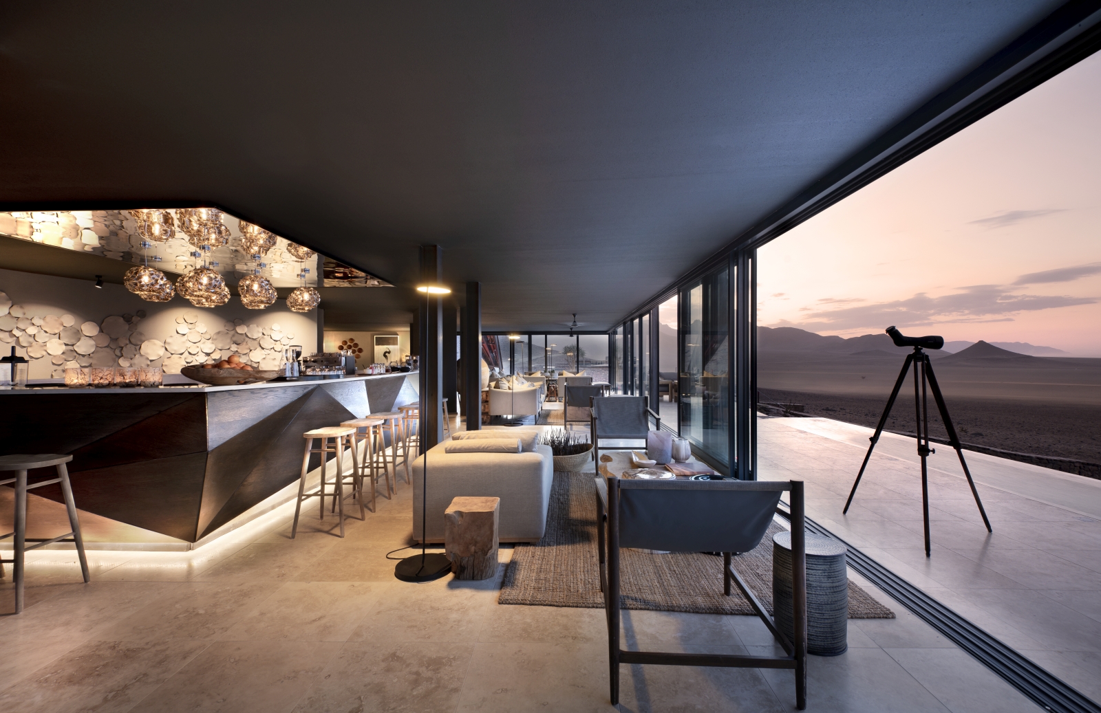 Lounge area with bar and veranda overlooking the desert
