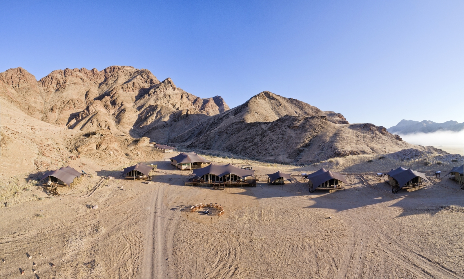 Aerial View over the tented camp and mountain range