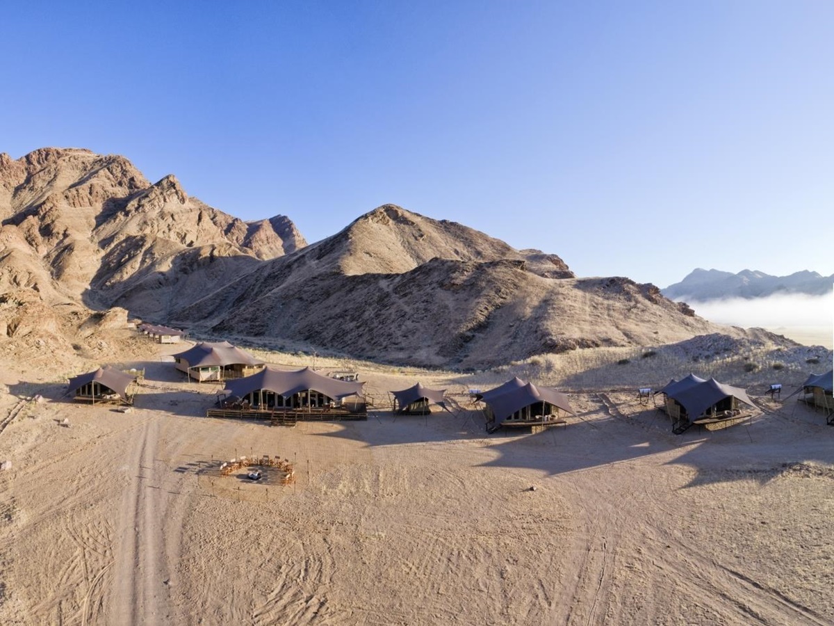 Aerial View over the tented camp and mountain range