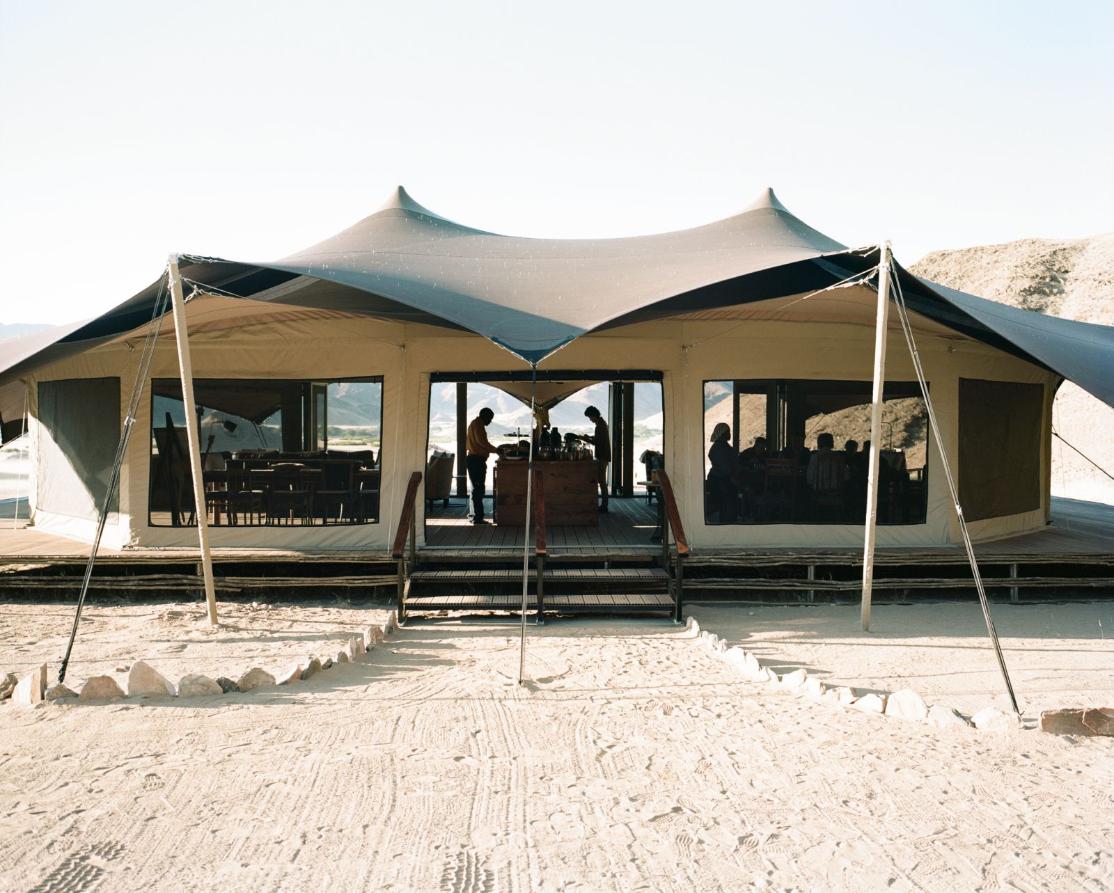 Exterior view of the main area at Hoanib Valley Camp in Namibia 