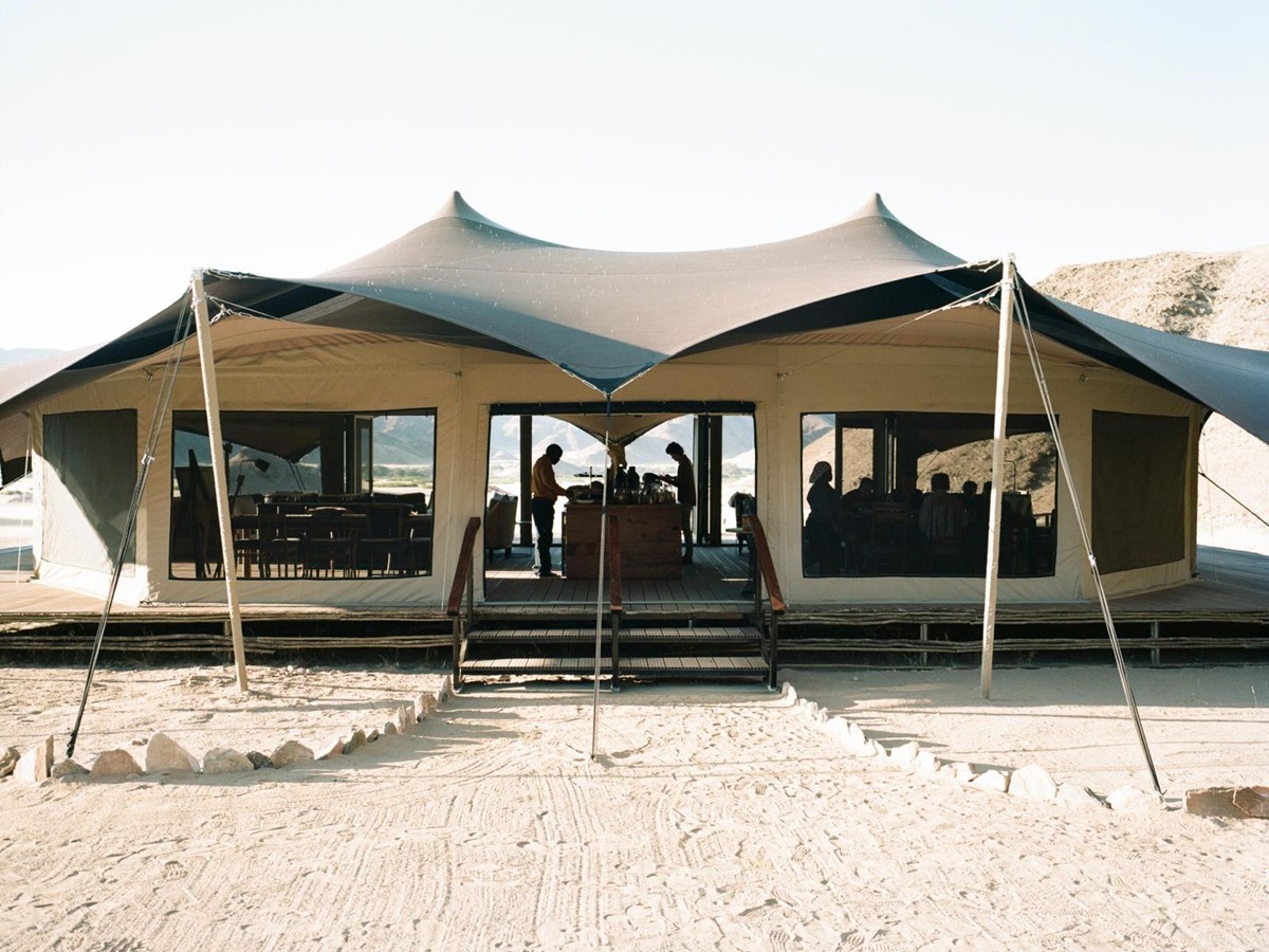 Exterior view of the main area at Hoanib Valley Camp in Namibia