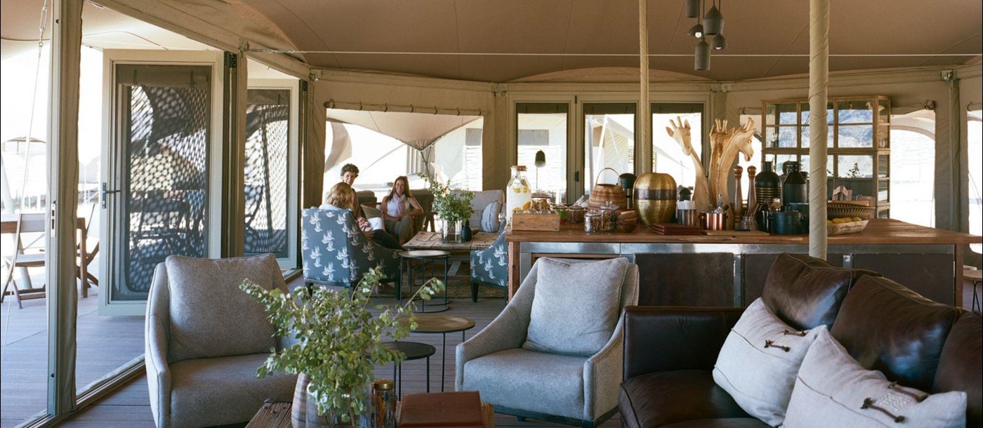 Interior view of the main area at Hoanib Valley Camp in Namibia  