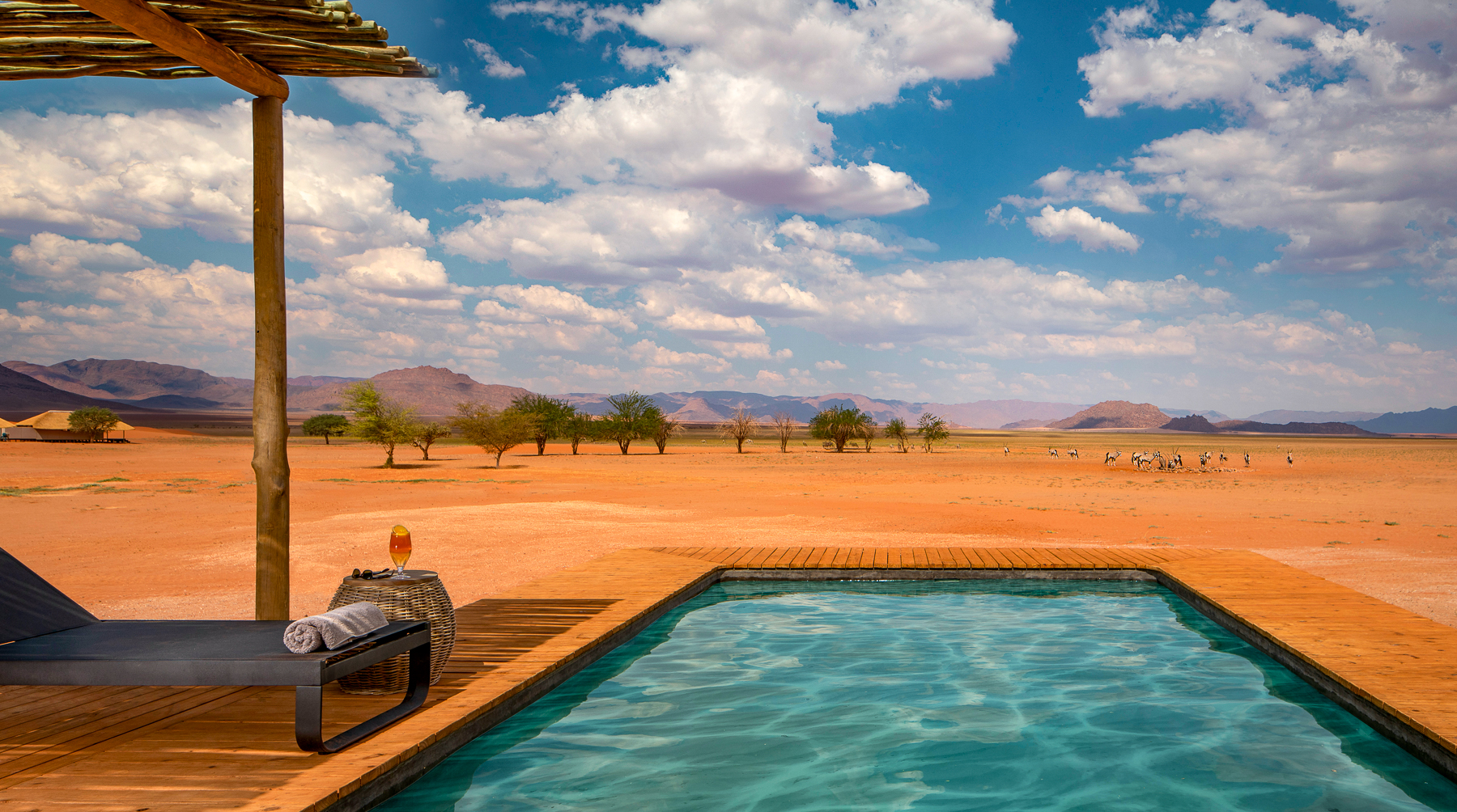 Swimming pool with desert views at Kwessi Dunes in Namibia