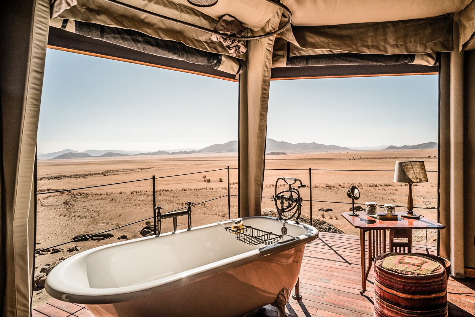 Bathtub with a panoramic view of the surrounding desert
