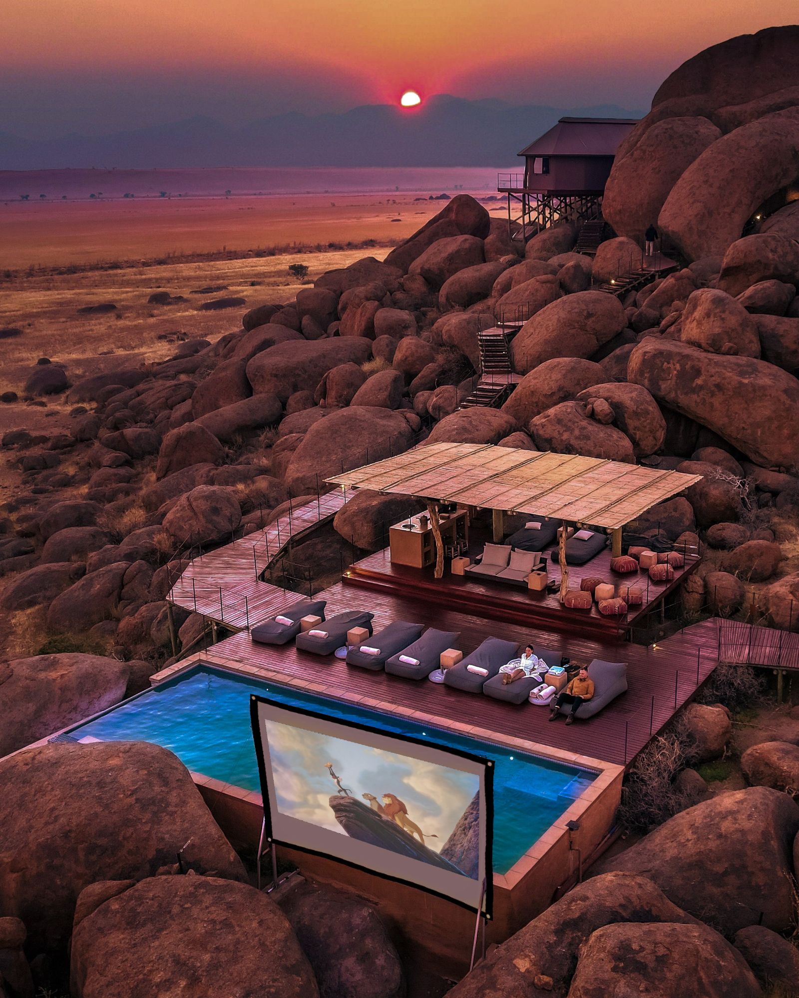 Open-air cinema by the pool of Sonop by Zannier in the NamibRand Reserve in Namibia