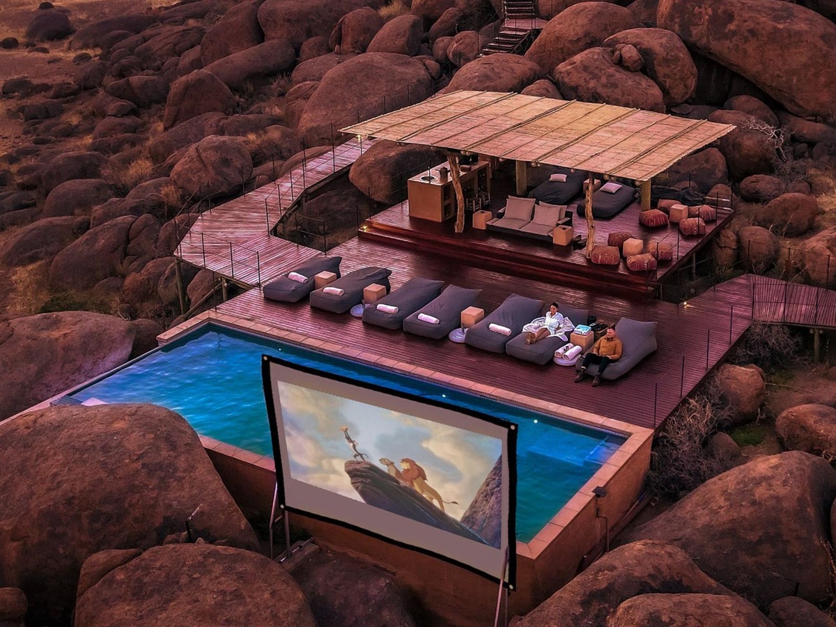 Open-air cinema by the pool of Sonop by Zannier in the NamibRand Reserve in Namibia