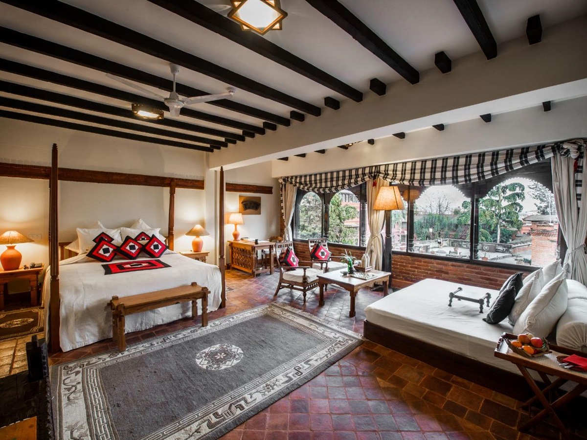 Junior suite bed at Dwarika's Hotel in Kathmandu