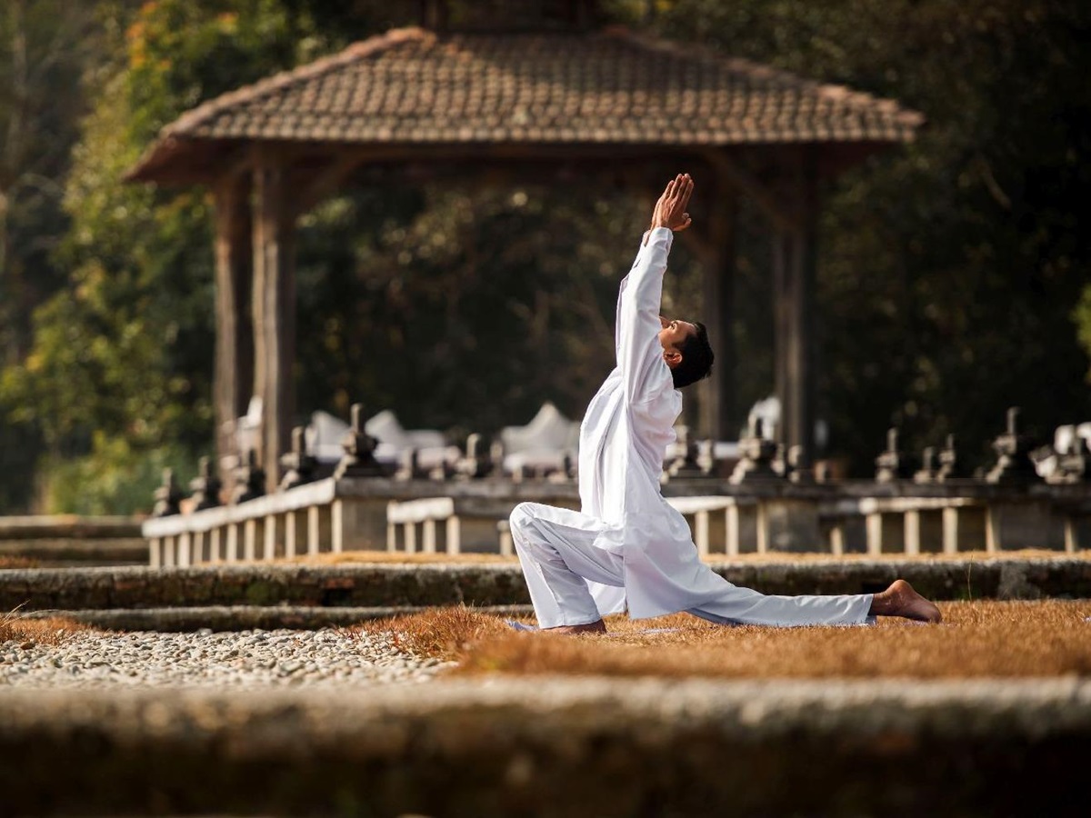Yoga practice in the grounds of Dwarika's Resort Dhulikhel Nepal