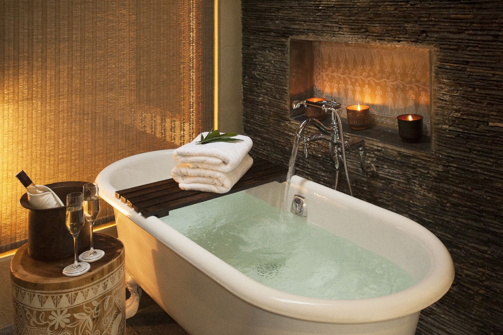 Bathtub of a suite at Meghauli Serai luxury safari camp Nepal