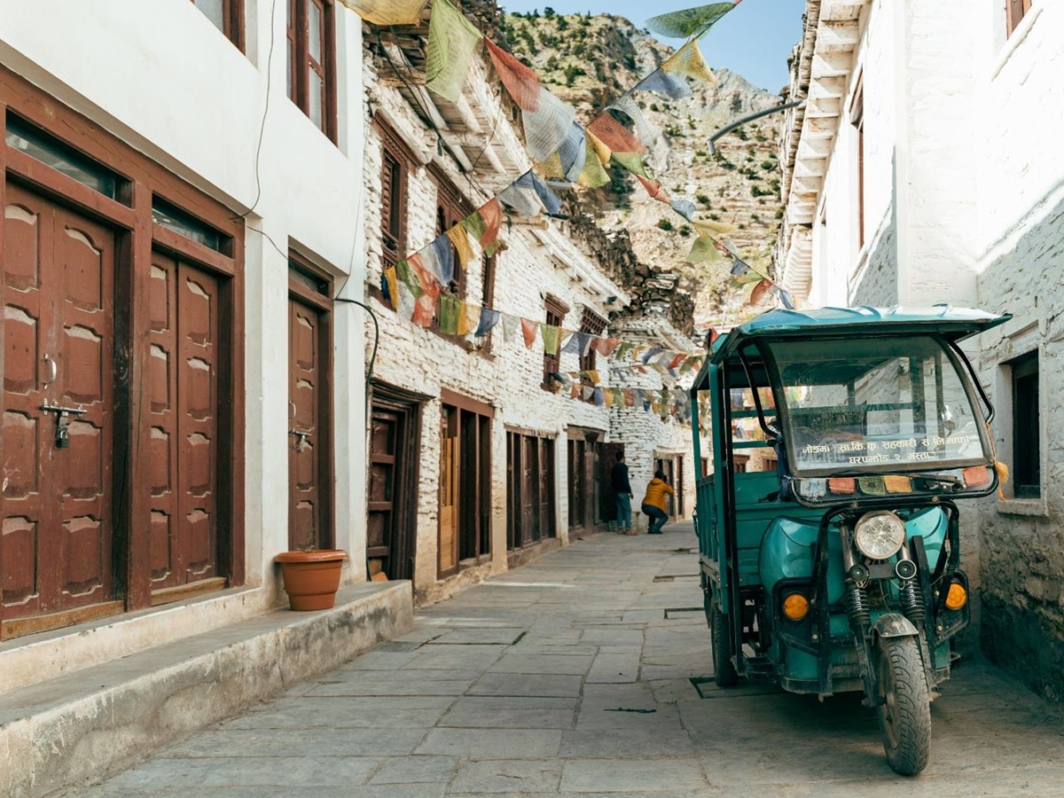 A tuk tuk in the street near https://www.redsavannah.com/europe/montenegro/hotels/regent-porto-montenegro